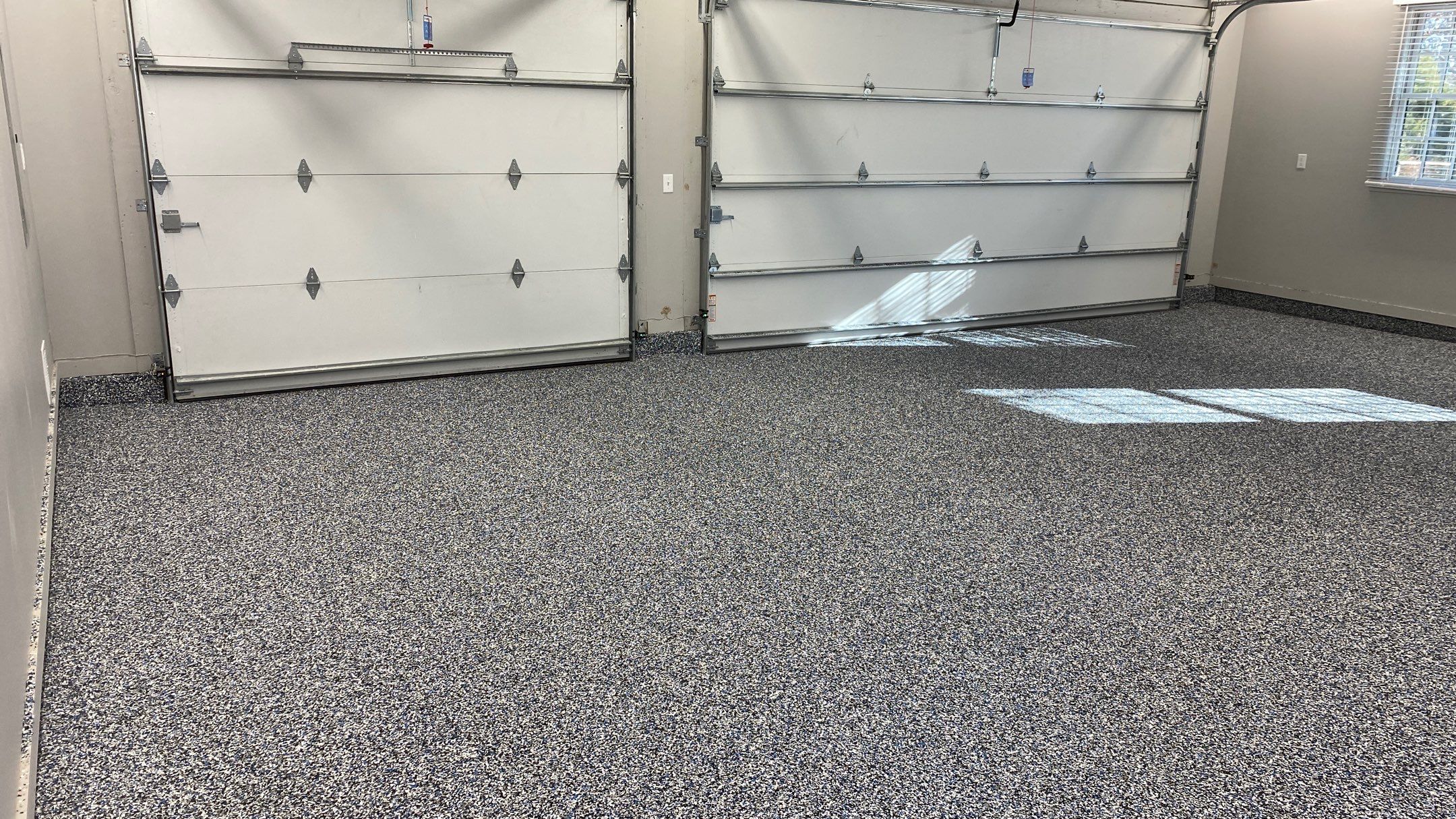 Francine B. gets a new garage floor!  by Banner Garage