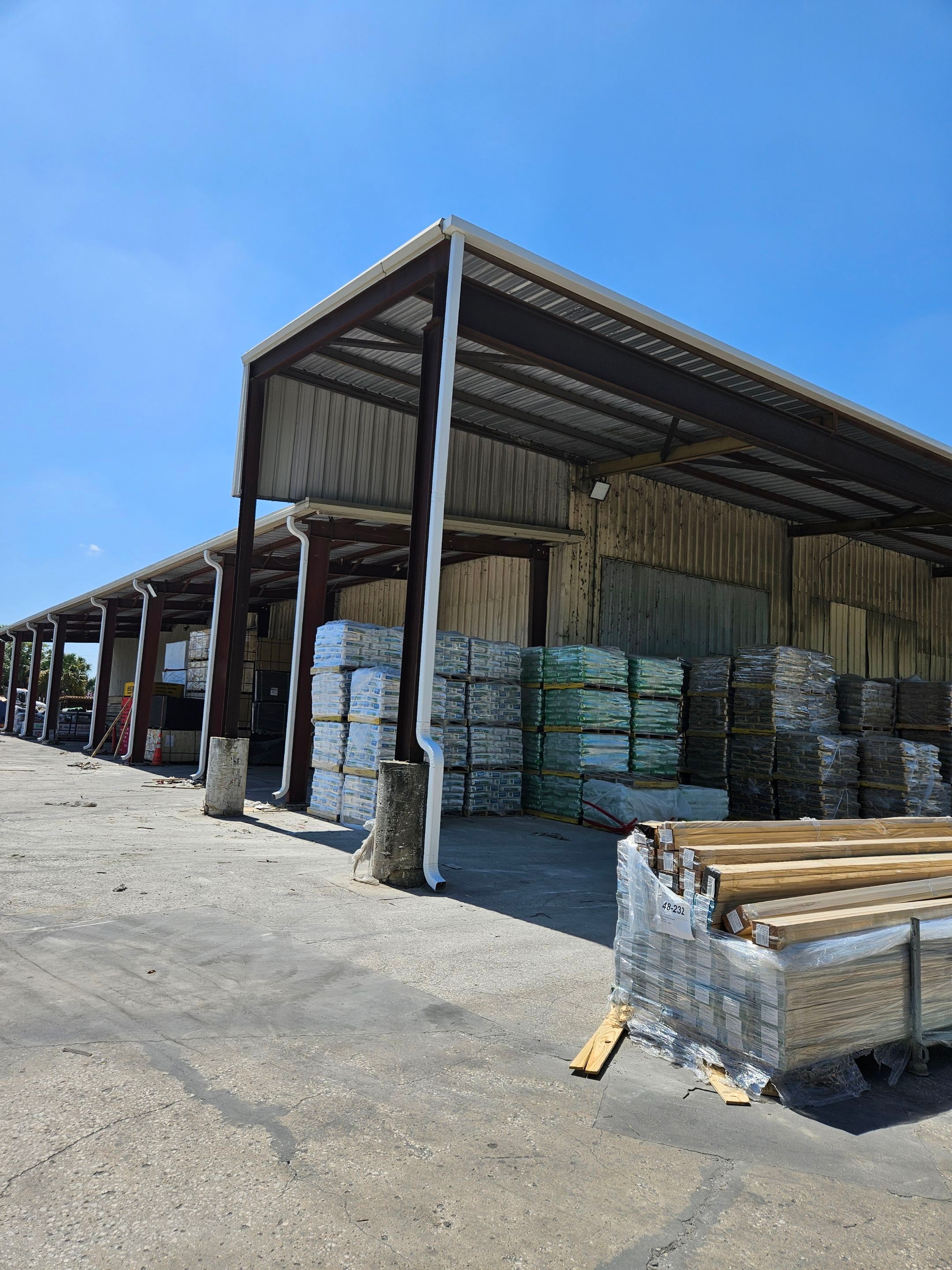 Commercial Box Gutters and White Downspouts Installation in Tampa FL by Gutter Professors