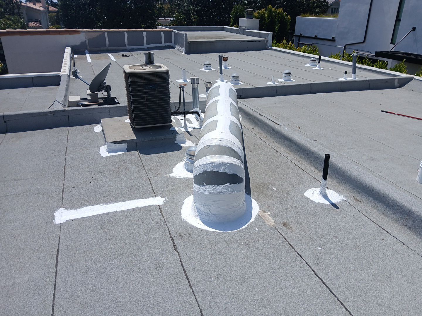 Silicone Membrane Installation using American Standard Coatings Silicone-S by Hull Brothers Roofing