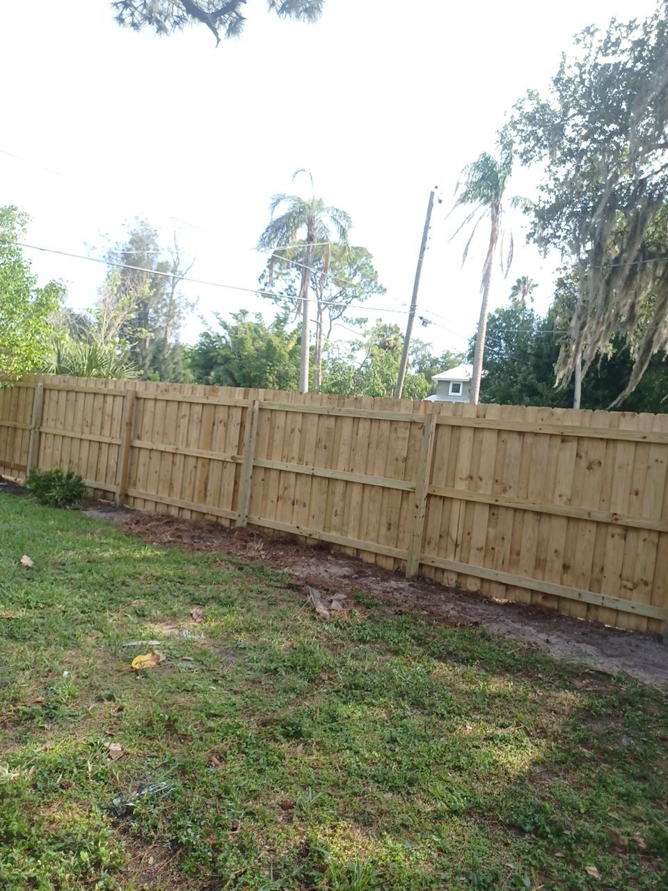 Sarasota, FL 6ft. Tall Treated Board on Board Wood Fence by Asap fence and gates, LLC