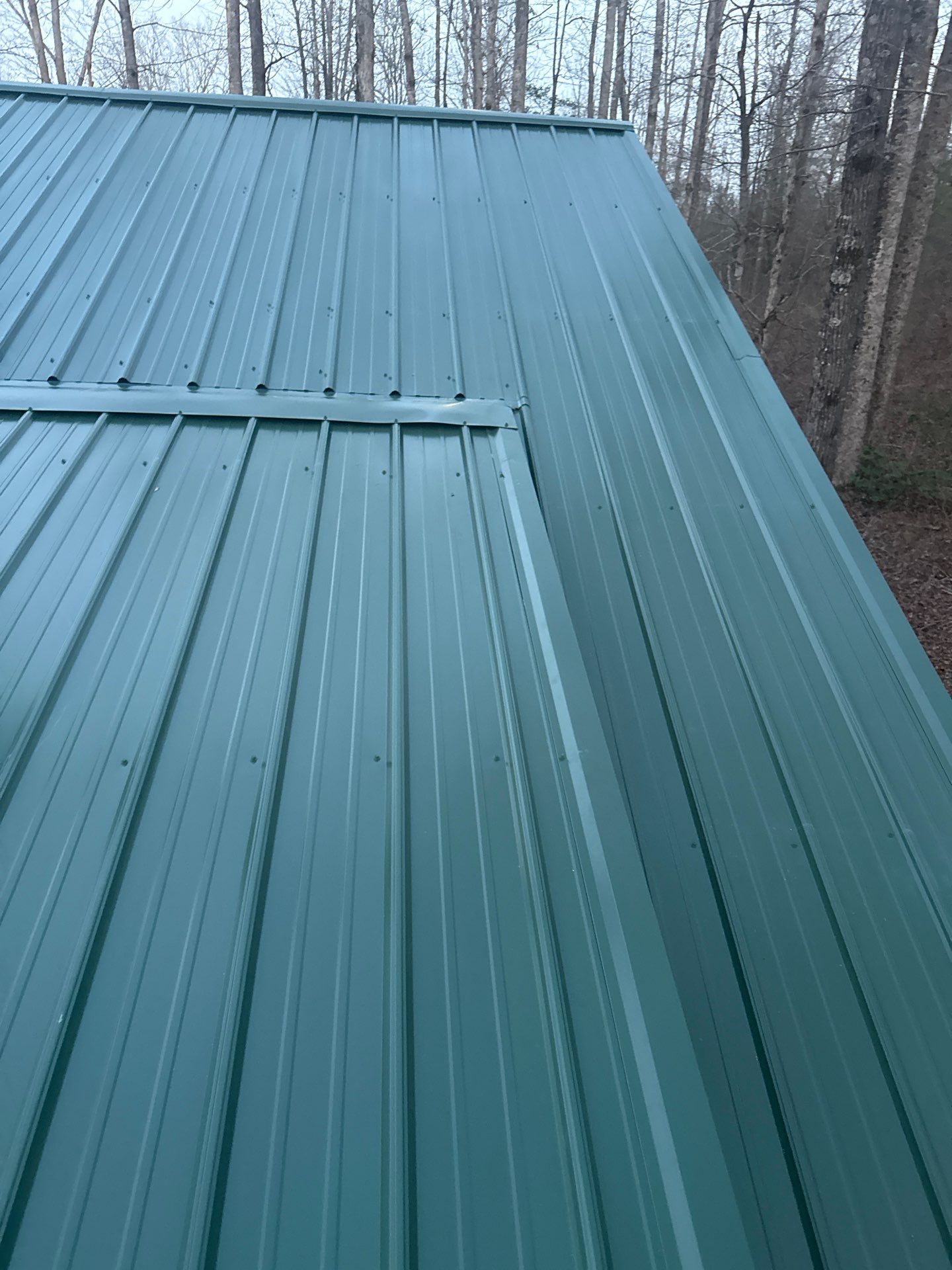 Metal Roof and Gutters Replacement in Hueytown by The Roofing Dudes