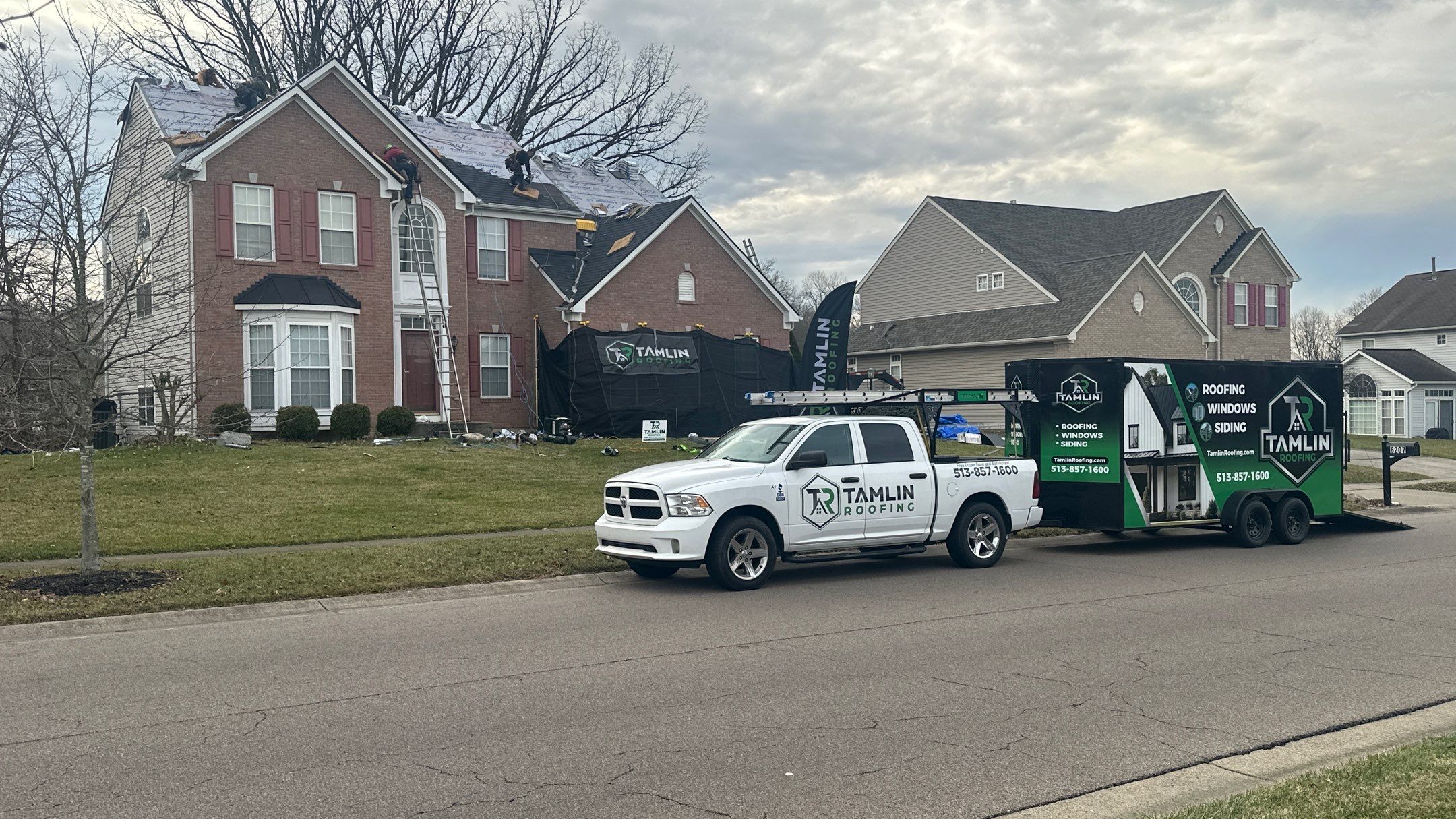 Walden Ponds - Pristine Black and Hydro Flo Gutter Guards by Tamlin Roofing