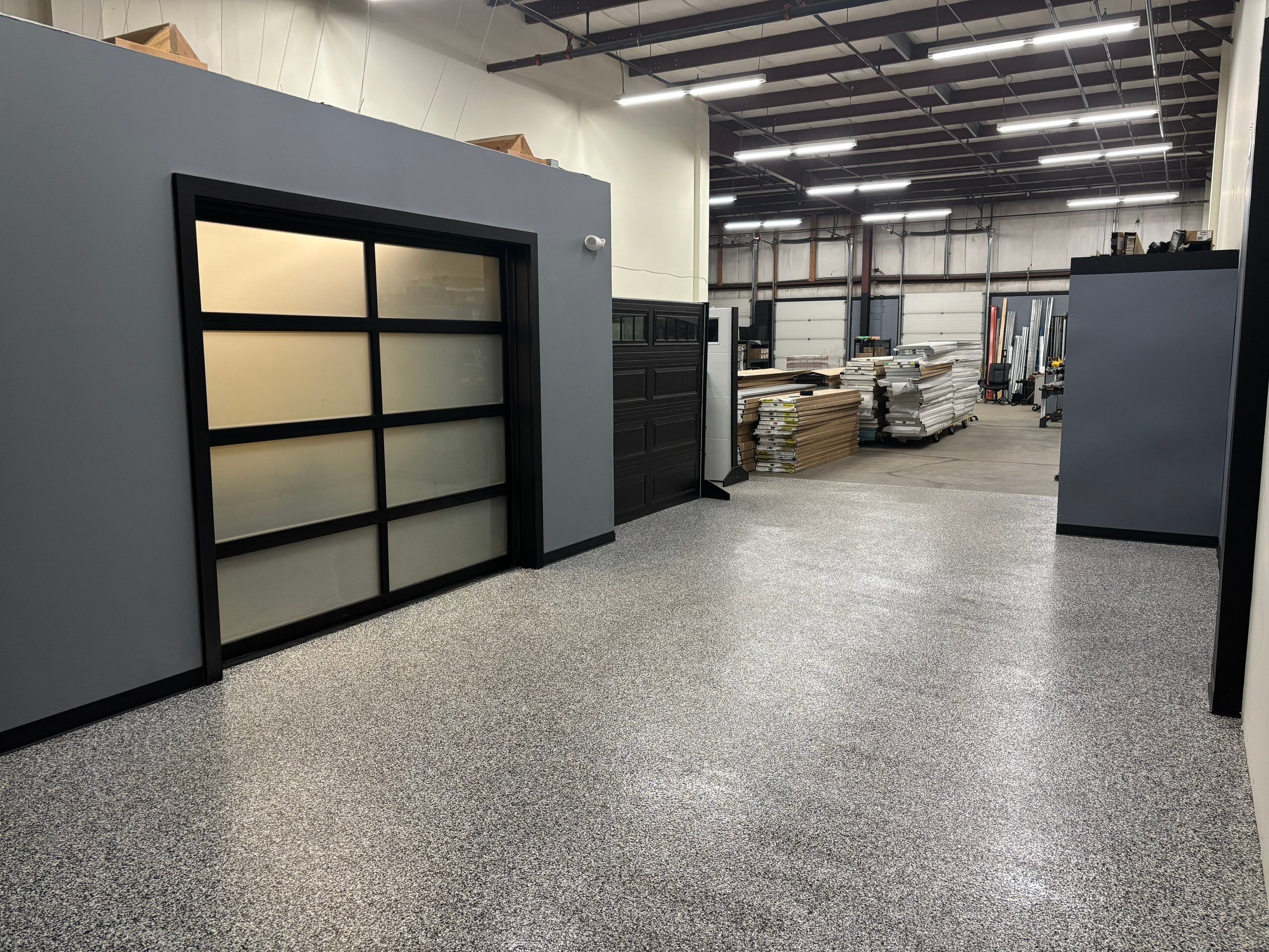 Garage Floor Coating Transformation by DiGiorgi Roofing and Siding Inc