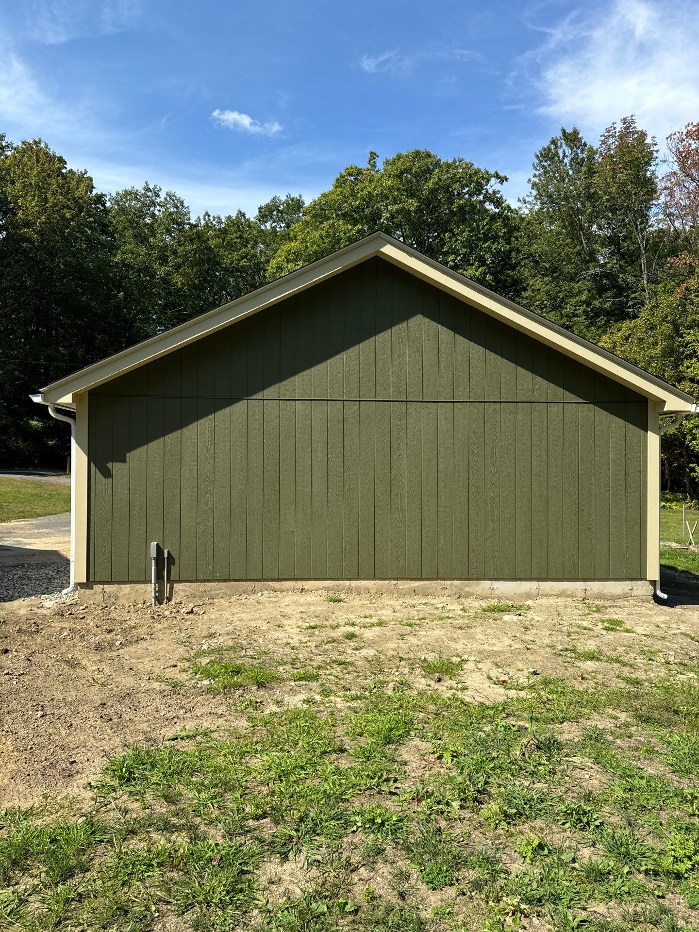 Two-Car Garage using LP SmartSide Panel Siding by Chagnon Building & Remodeling LLC