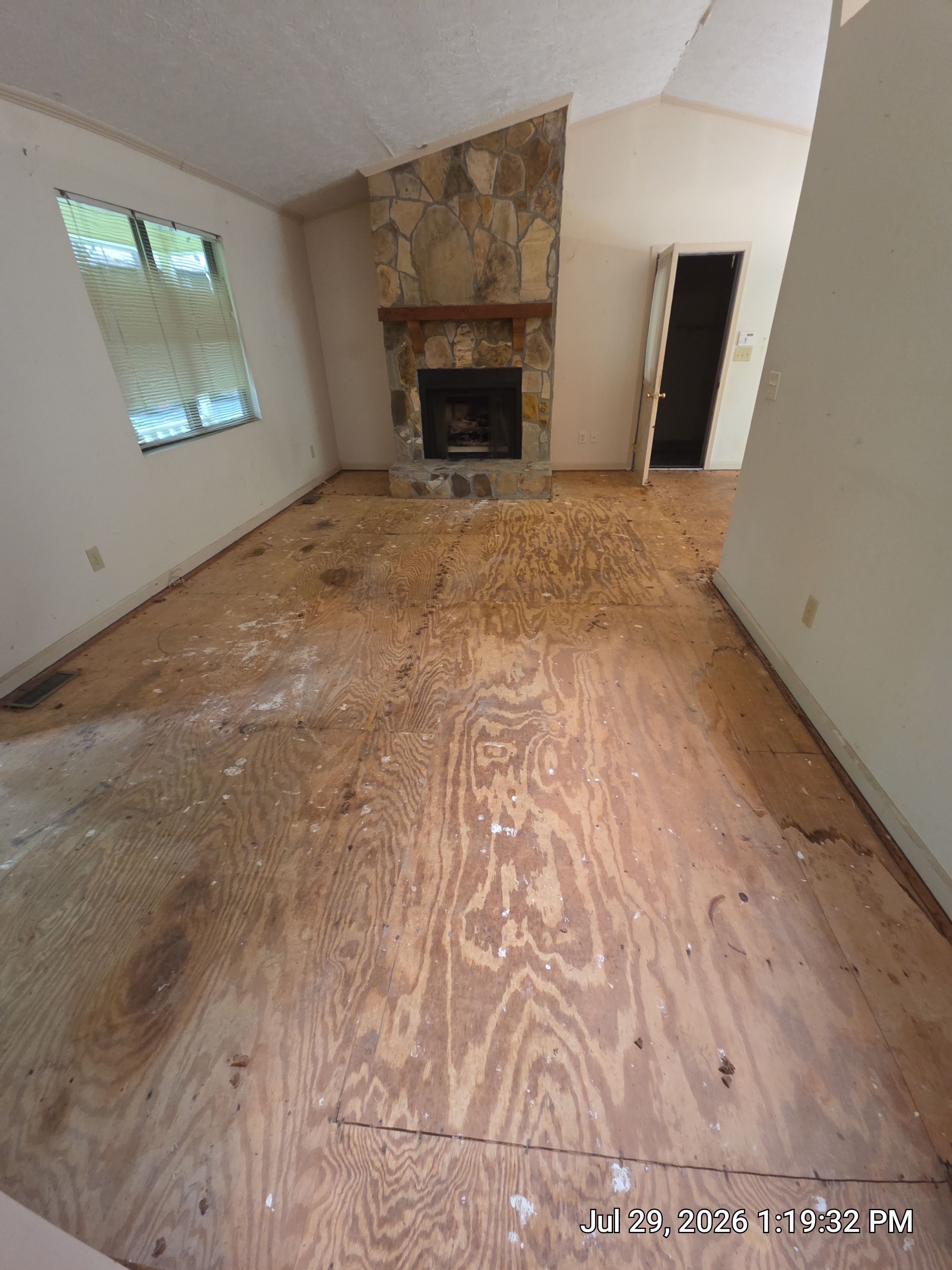 Full Home Subfloor Restoration and Luxury Vinyl Flooring Installation by Flooring Xpress CO