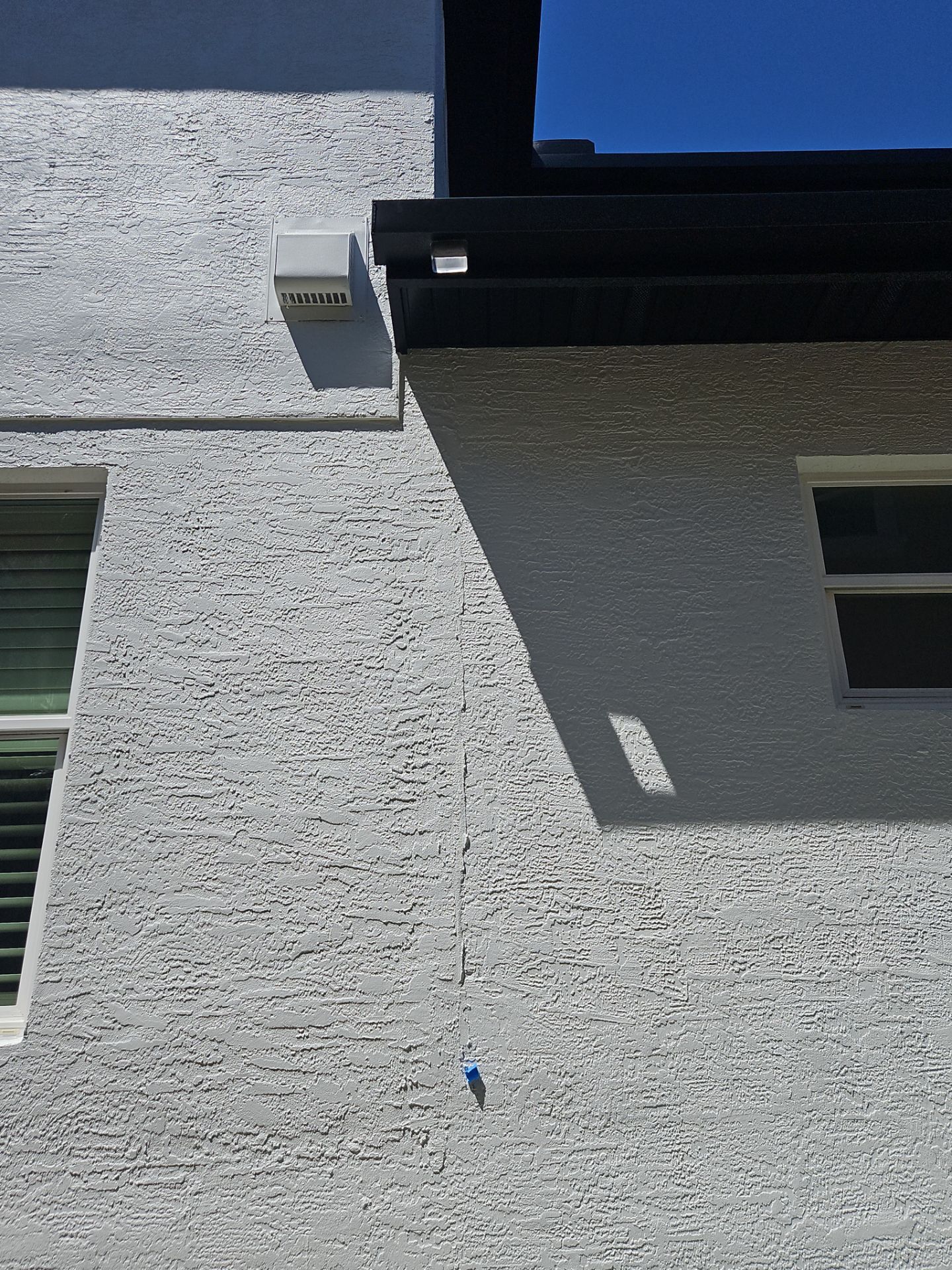 Soffit and Fascia Installation and black seamless gutters in Sarasota FL by Gutter Professors