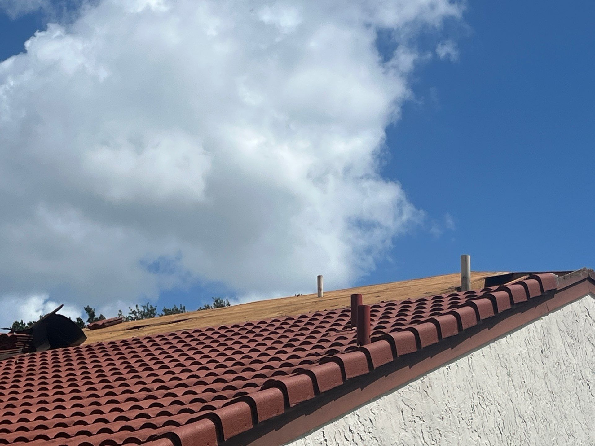Residential Tile Roof Replacement and Gutter Installation in Winter Park by Pinnacle Roofing Group
