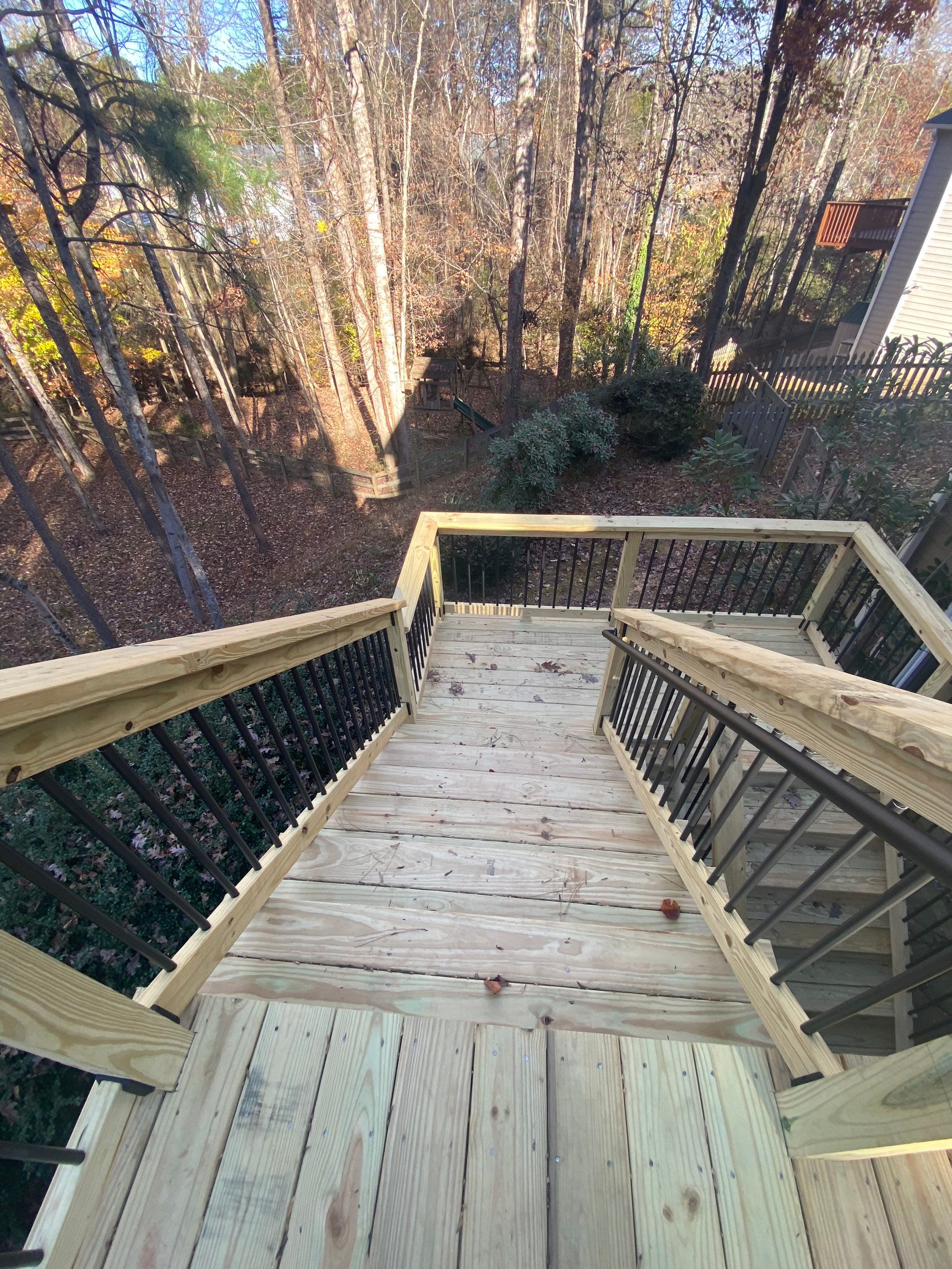 Elevated Wooden Deck and Staircase Construction in Cumming by Swift Home Renovations