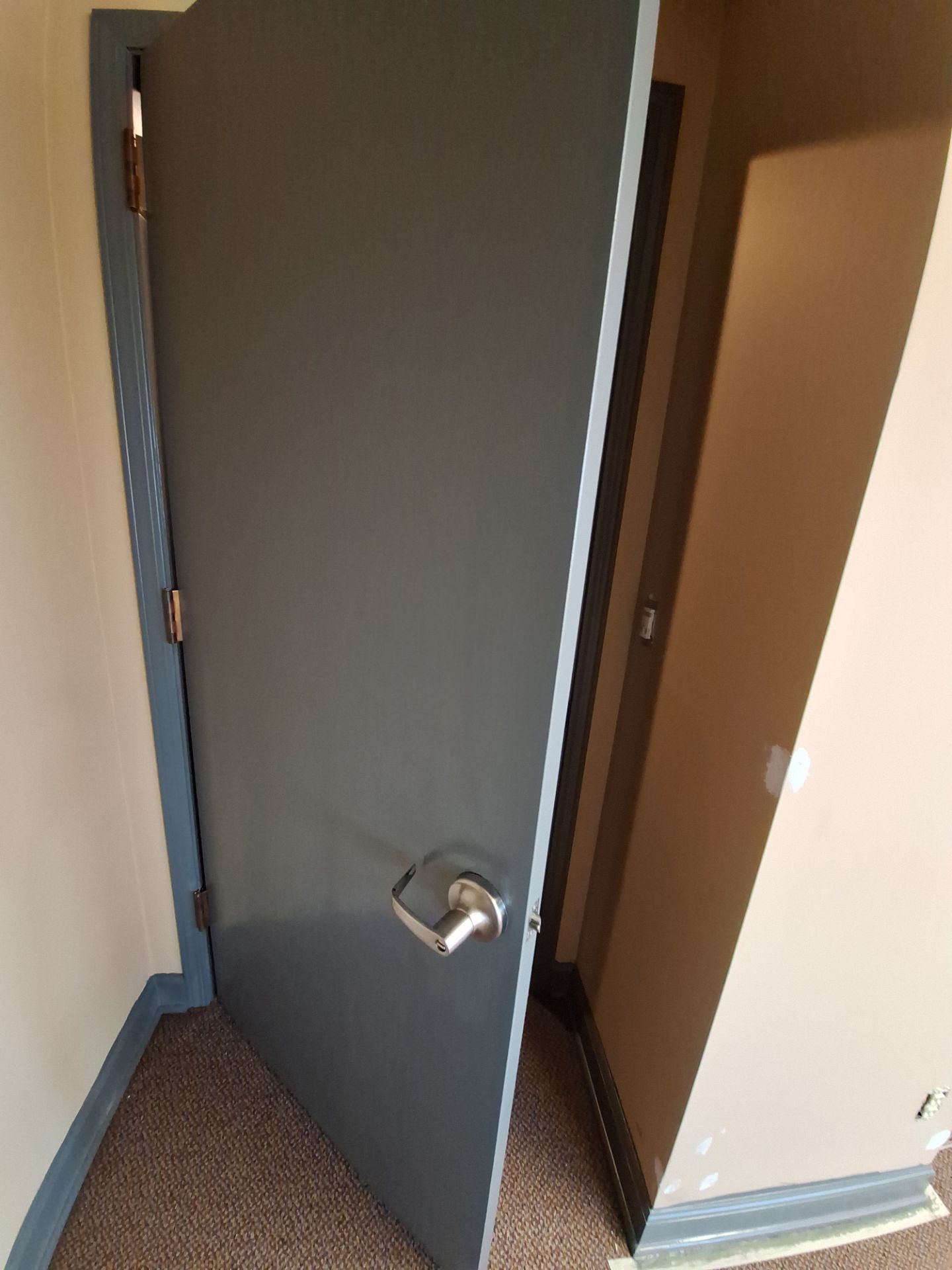Interior Office Painting & Wall Repair in Downtown Muskegon by Gordon Painting