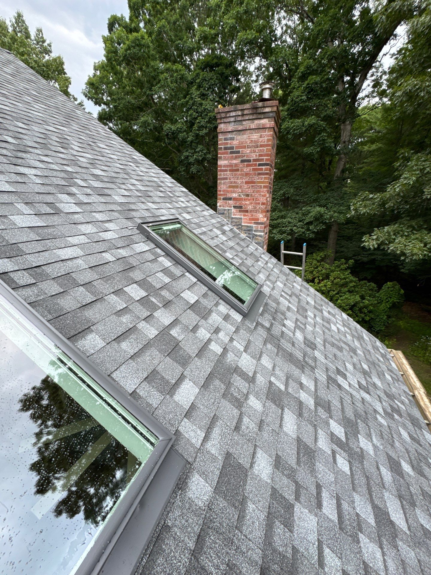 Complete Exterior Remodel in Stratham, NH Near Turnberry Road with Roofing, Siding, Windows, Gutters, and PVC Trim by Compass exteriors
