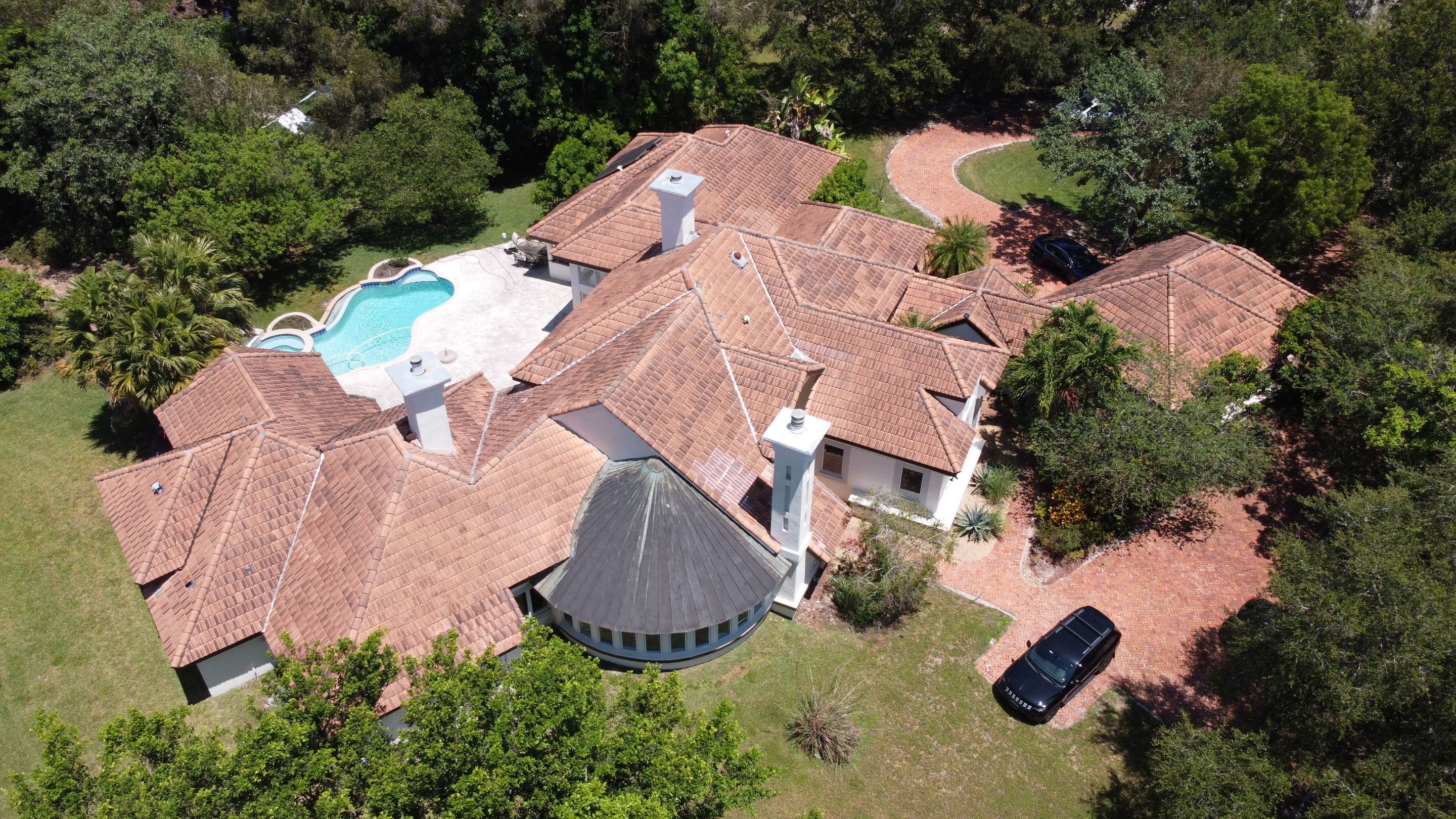 Residential Roofing Installation using 1" Nail strip metal roof by BLUES BROTHERS CONSTRUCTION CORP