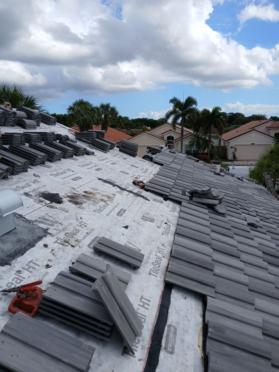 Residential Concrete Tile Roof Replacement and Fascia Repair in Boca Raton by Aastro Roofing