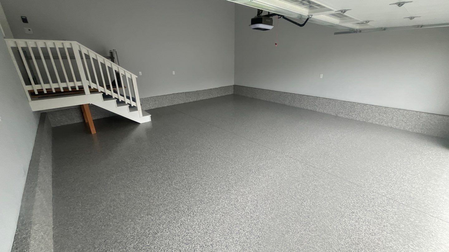 Garage in Londonderry, NH 03053 by Symphony Concrete Coatings