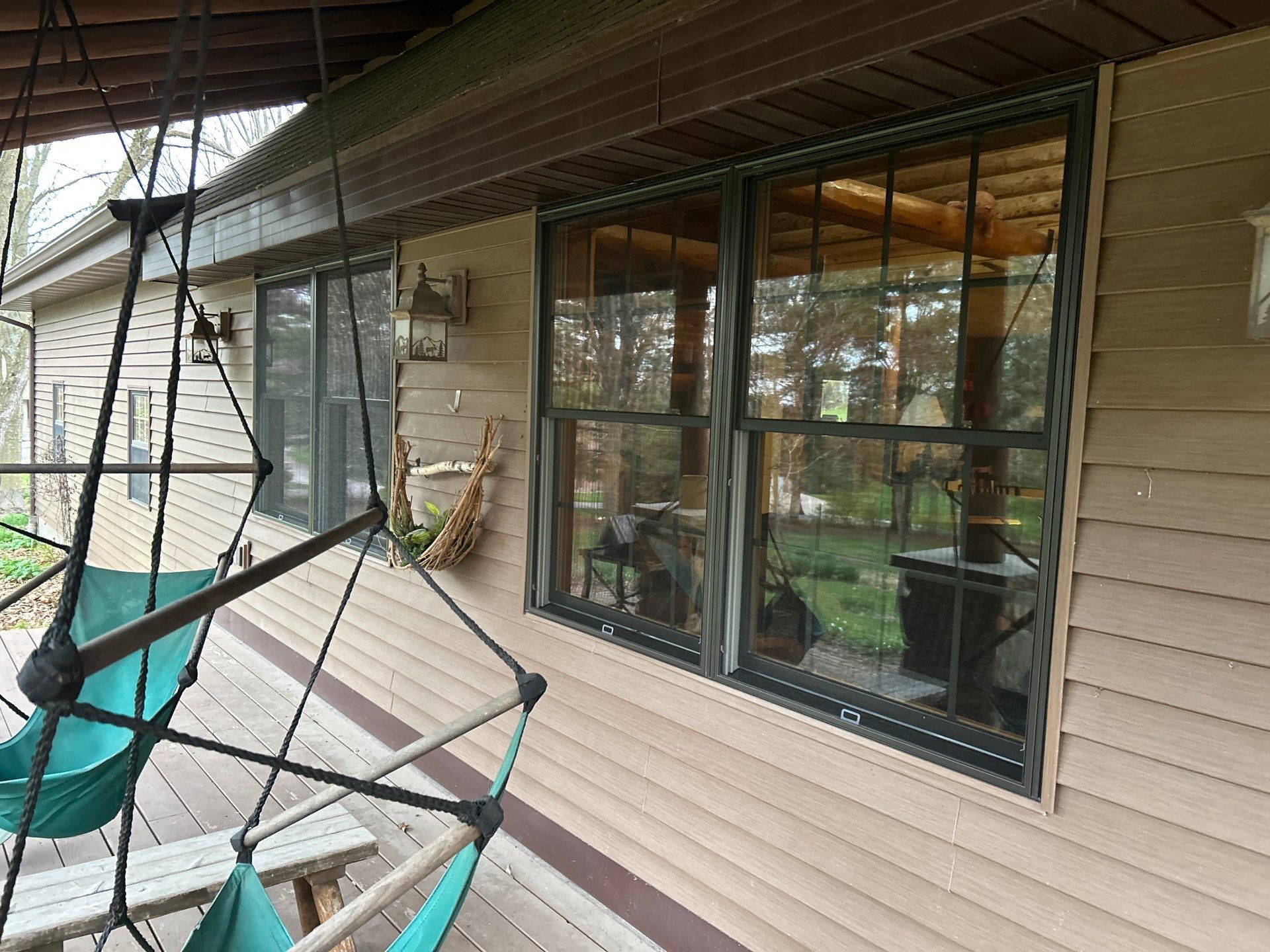 Pella Window installation using Pella Lifestyle wood/Aluminum window by United Windows and Siding LLC