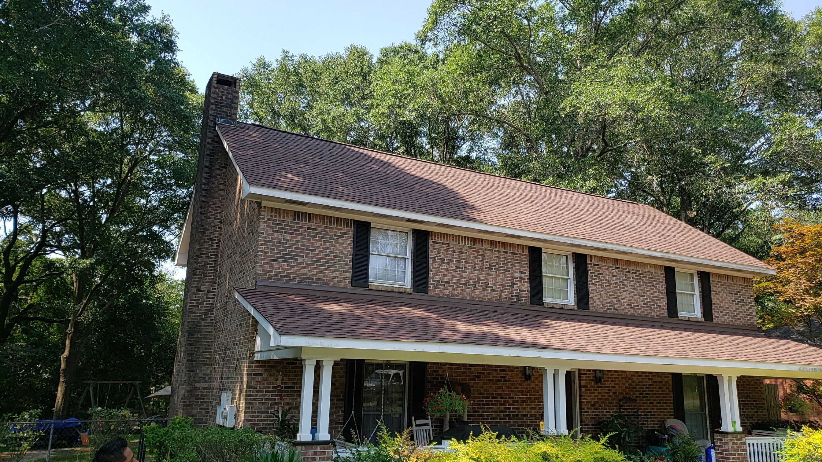 Residential Roofing Installation using Roof Replacement by American Roofing & Construction LLC