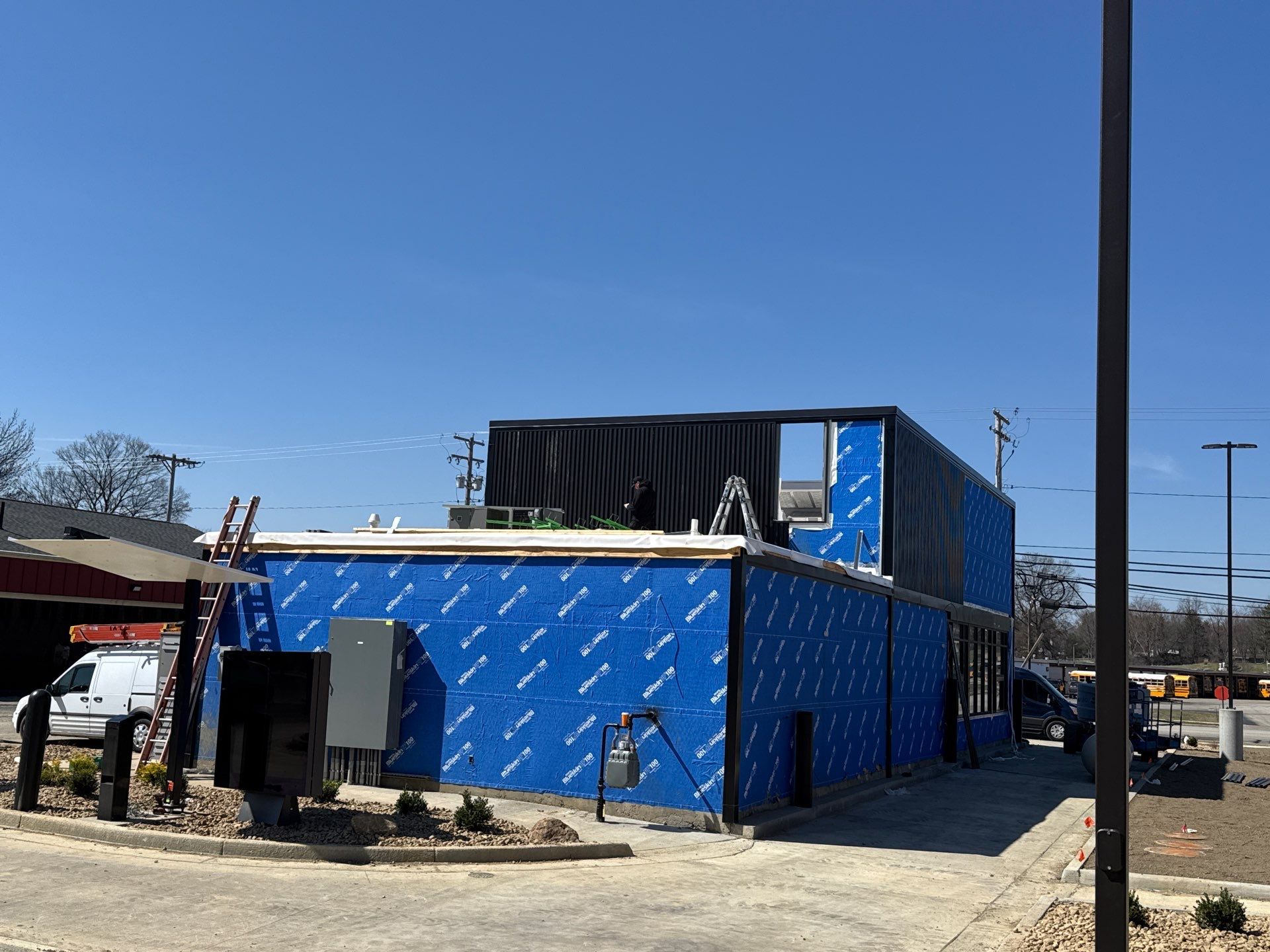 Commercial Roofing Installation using Duro-Last 50 mil PVC by 3 Daughters Construction 