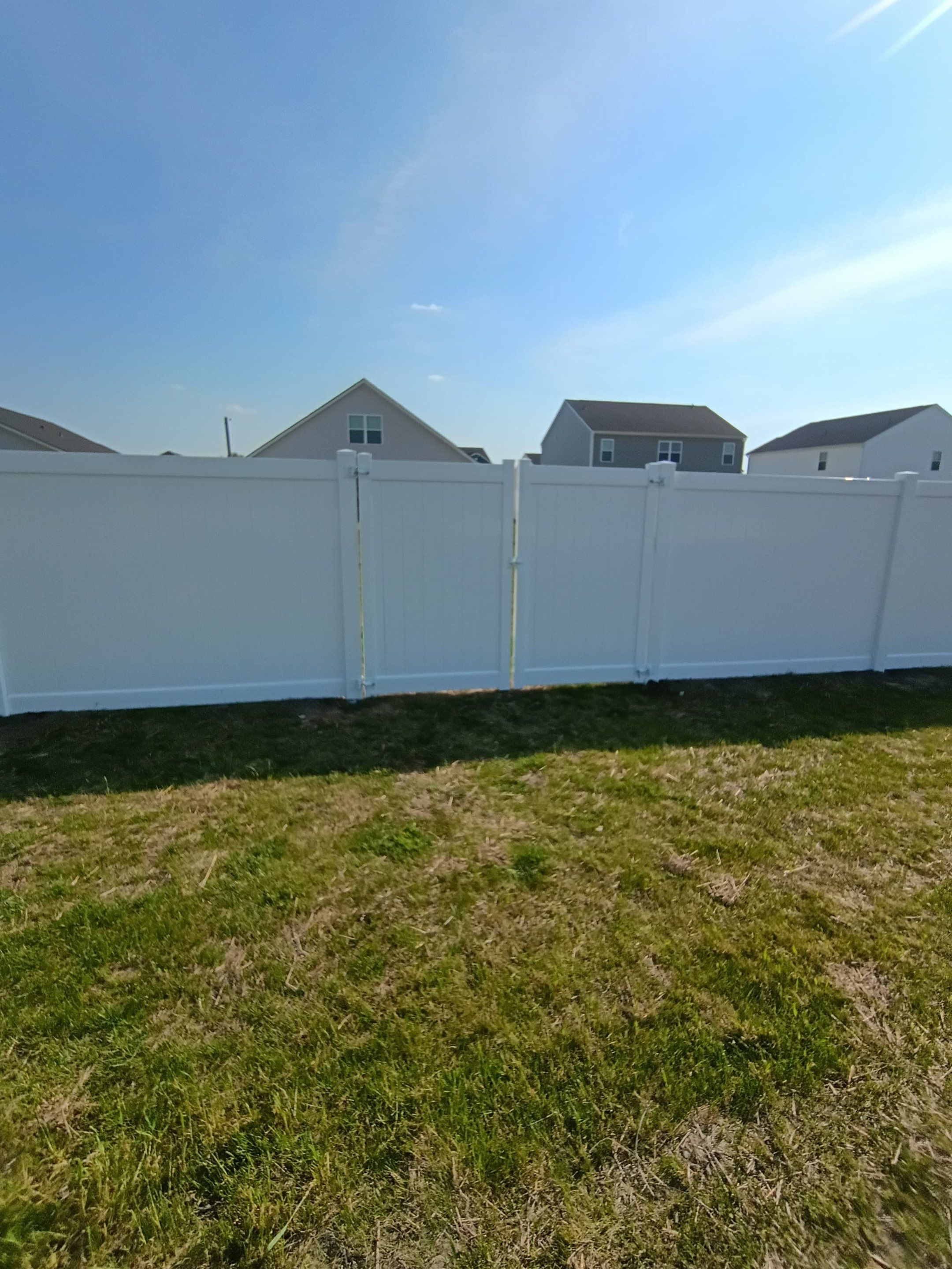 White Vinyl Privacy Fence Installation in Ayden, North Carolina by Superior Fence and Rail