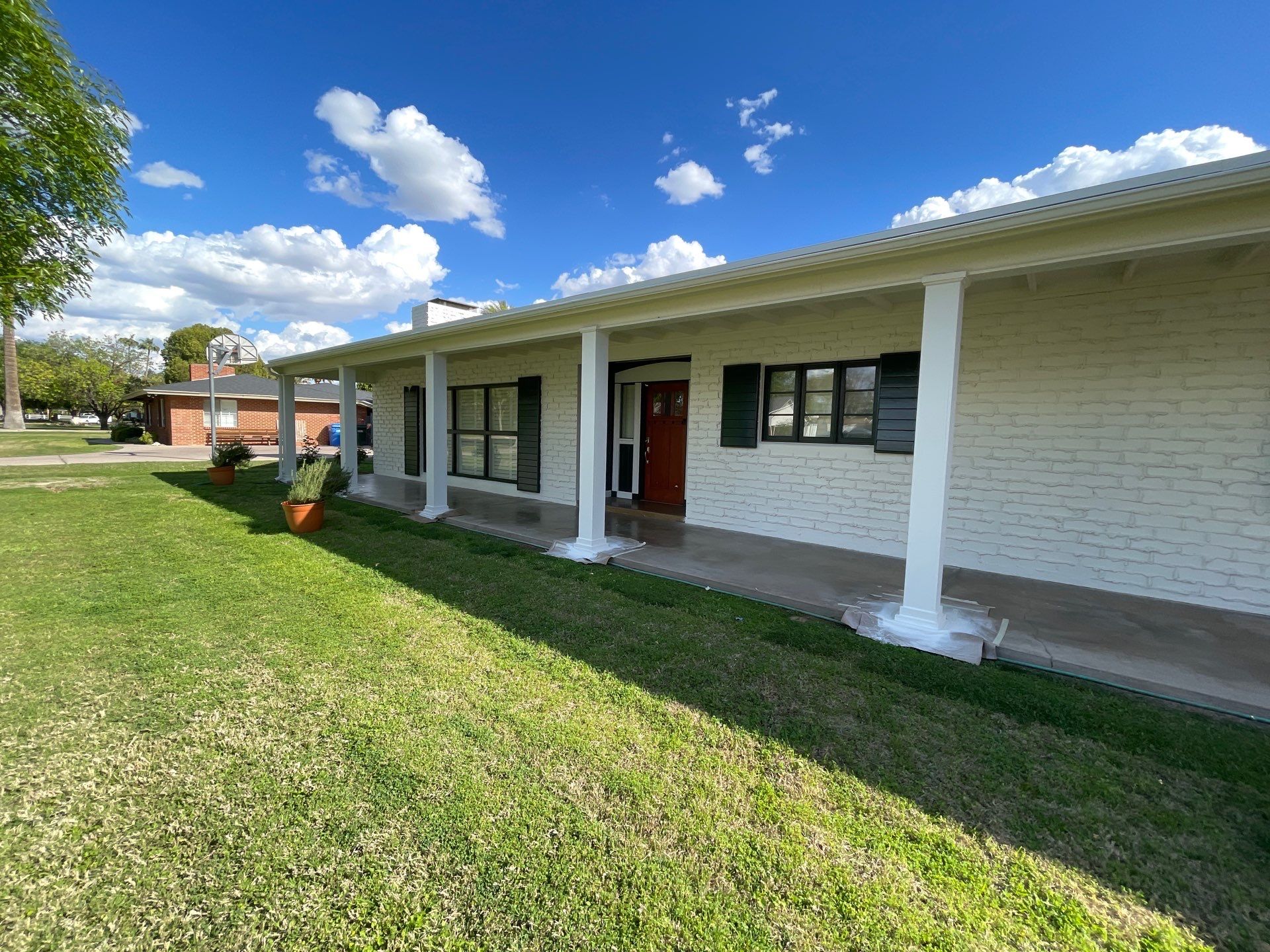 Wagon Wheel - A Stunning Home Exterior Makeover with Dunn Edwards Paints in Phoenix, AZ by Double G Painting Contractors, LLC