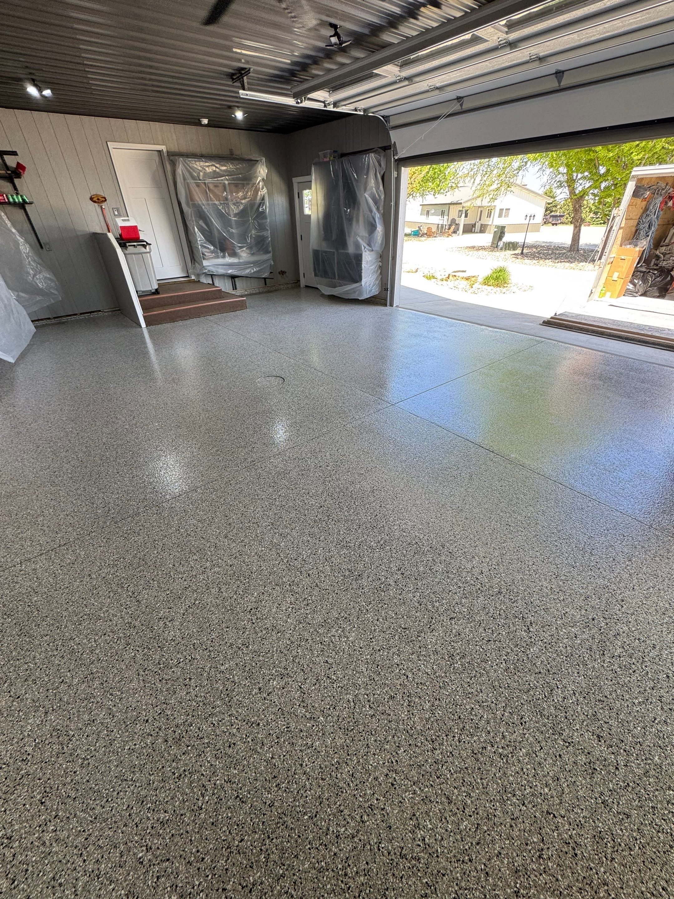 High-Gloss Grey Epoxy Floor Coating for Inwood Garage by Select Painting, Coatings & Garage Cabinets