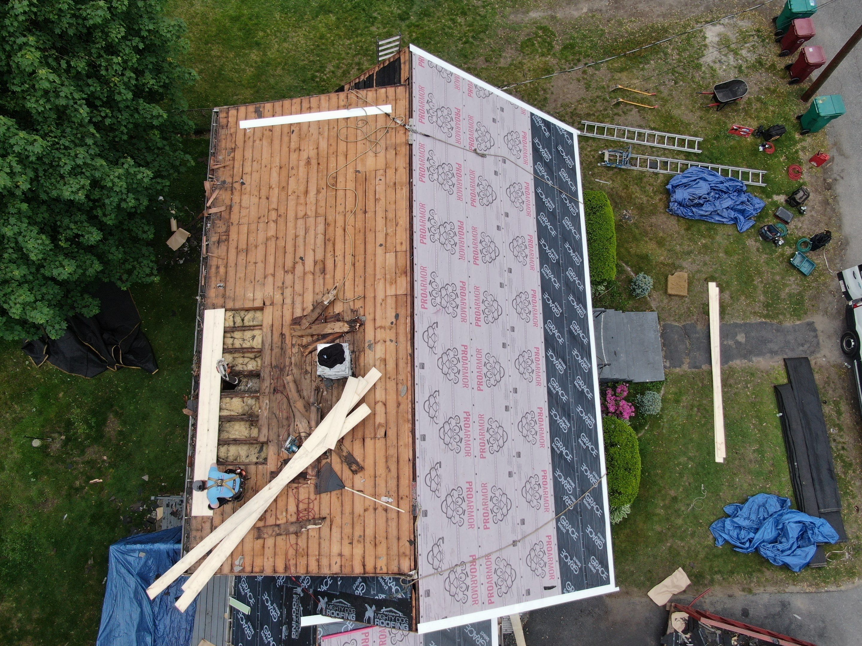 Roof and Flat Roof Membrane Replacement in Lowell, MA by Mighty Dog Roofing of Greater Middlesex County