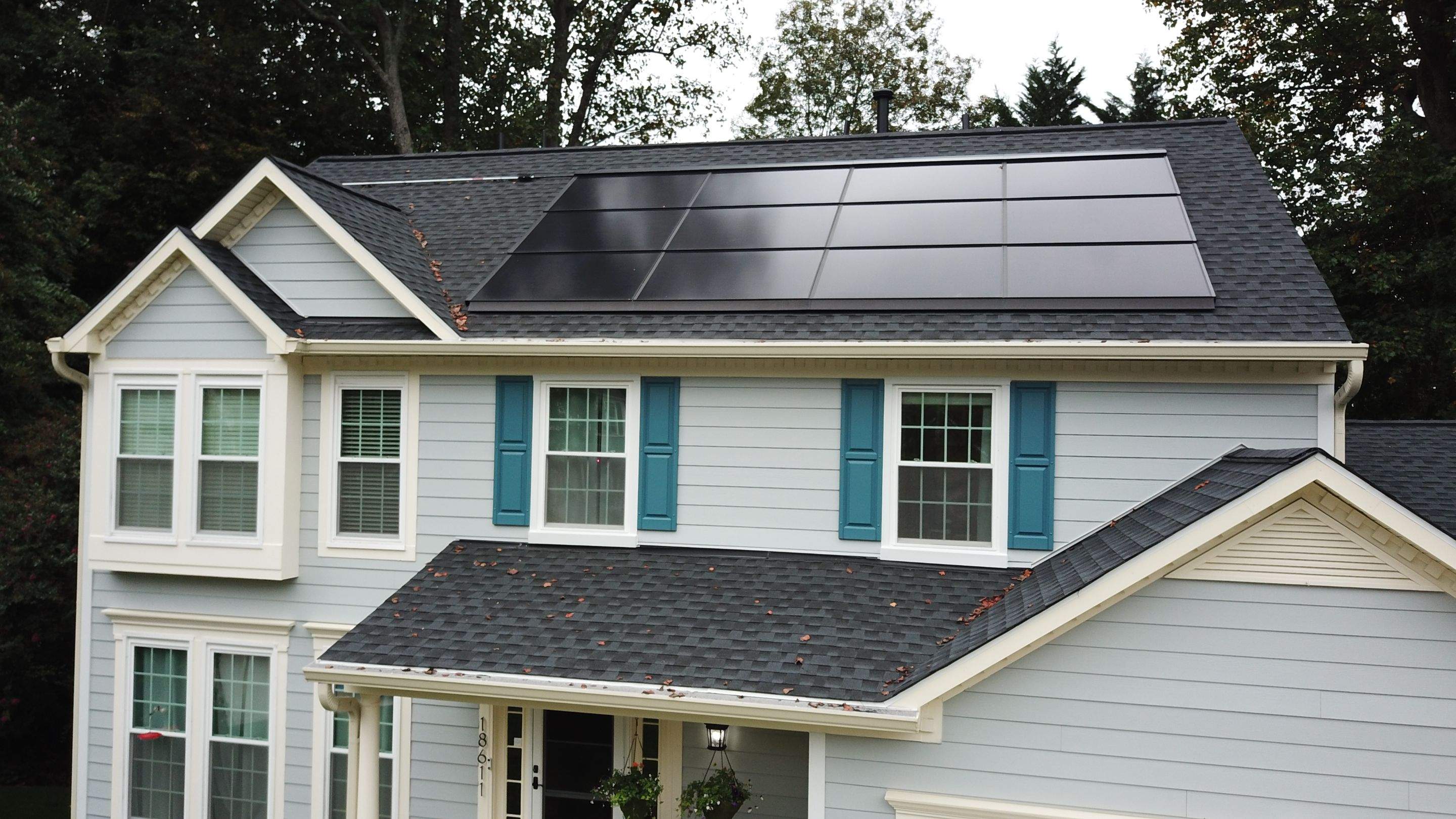 Exterior Home Makeover using GAF Timberline HDZ, GAF Decotech, and James Hardie Siding by American Home Contractors