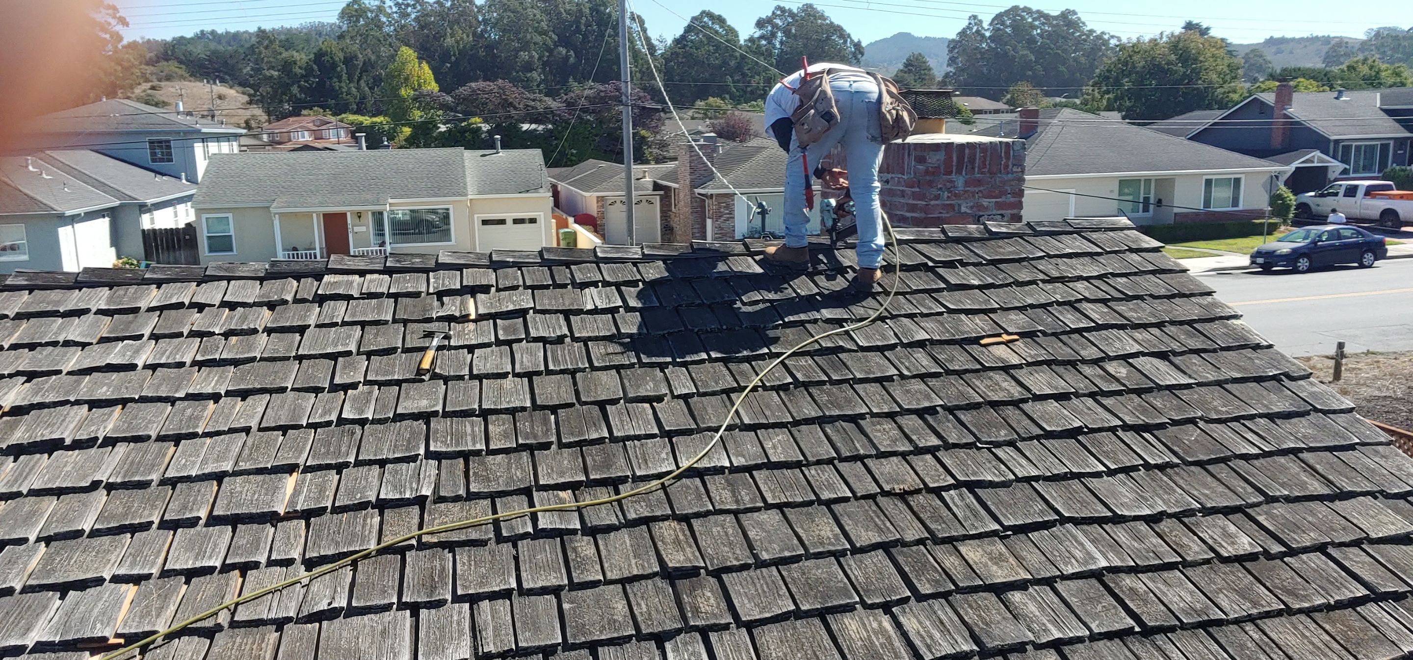 Refurbish and repair shake roof to get ready to sell by Straight Edge Roofing Inc