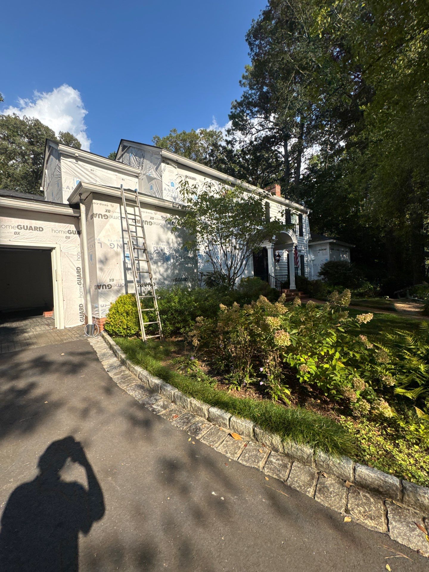 Siding Installation using James Hardie Color Plus Lap Siding by Nelson Exteriors 