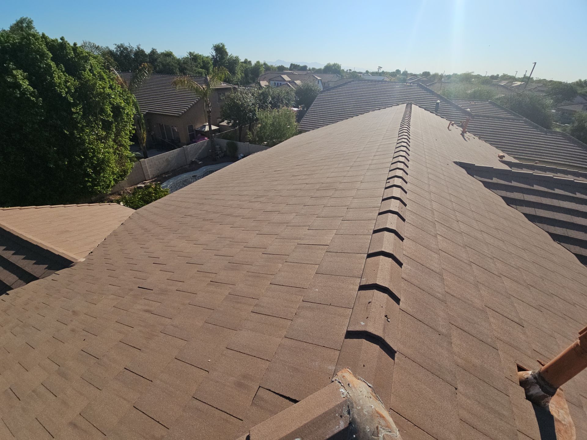 Residential Roofing Installation using Concrete Tile by Weather-Tite Exteriors LLC