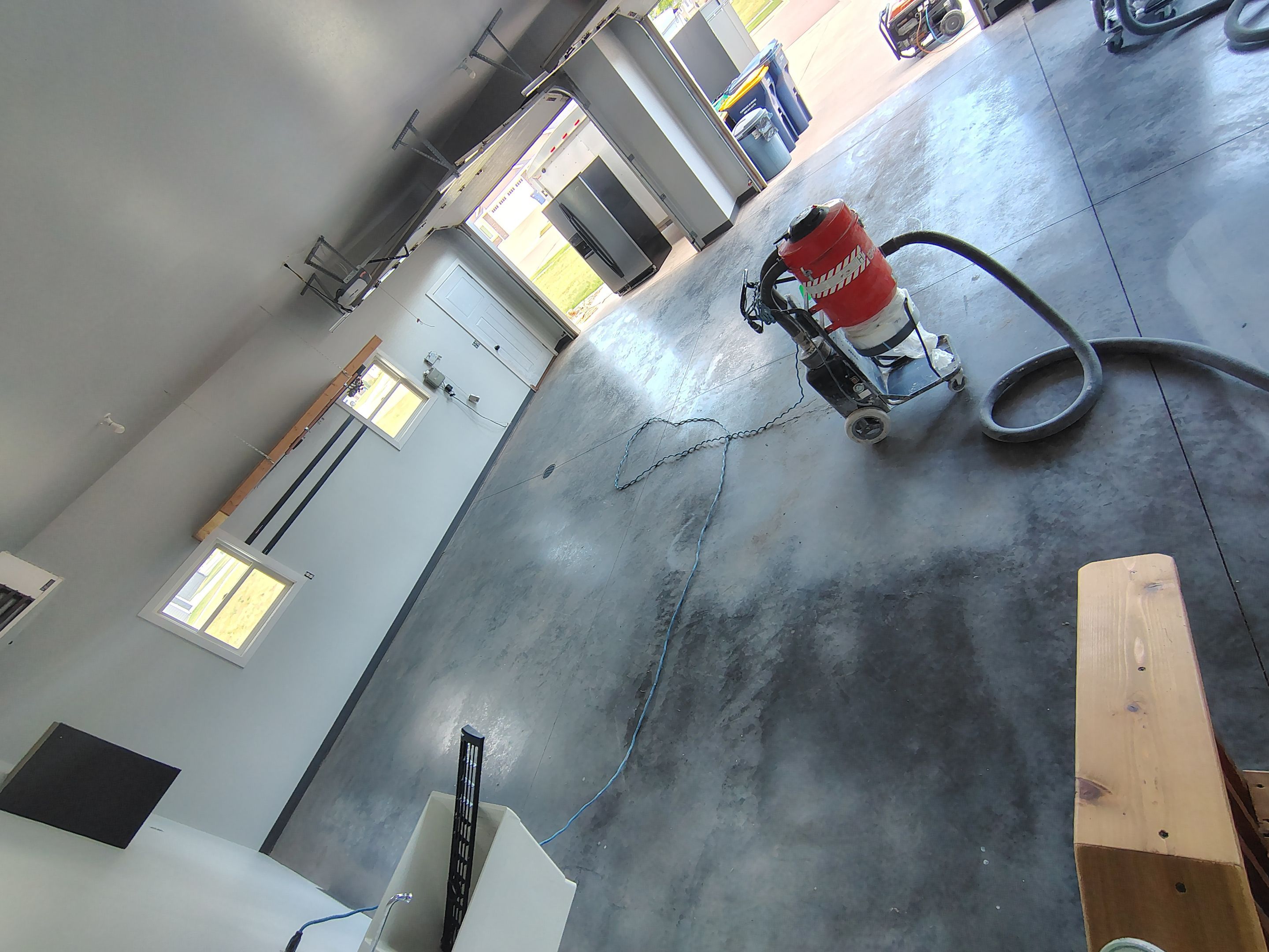 Multi-Car Garage Concrete Coating and Crack Repair in Dell Rapids by Select Painting, Coatings & Garage Cabinets