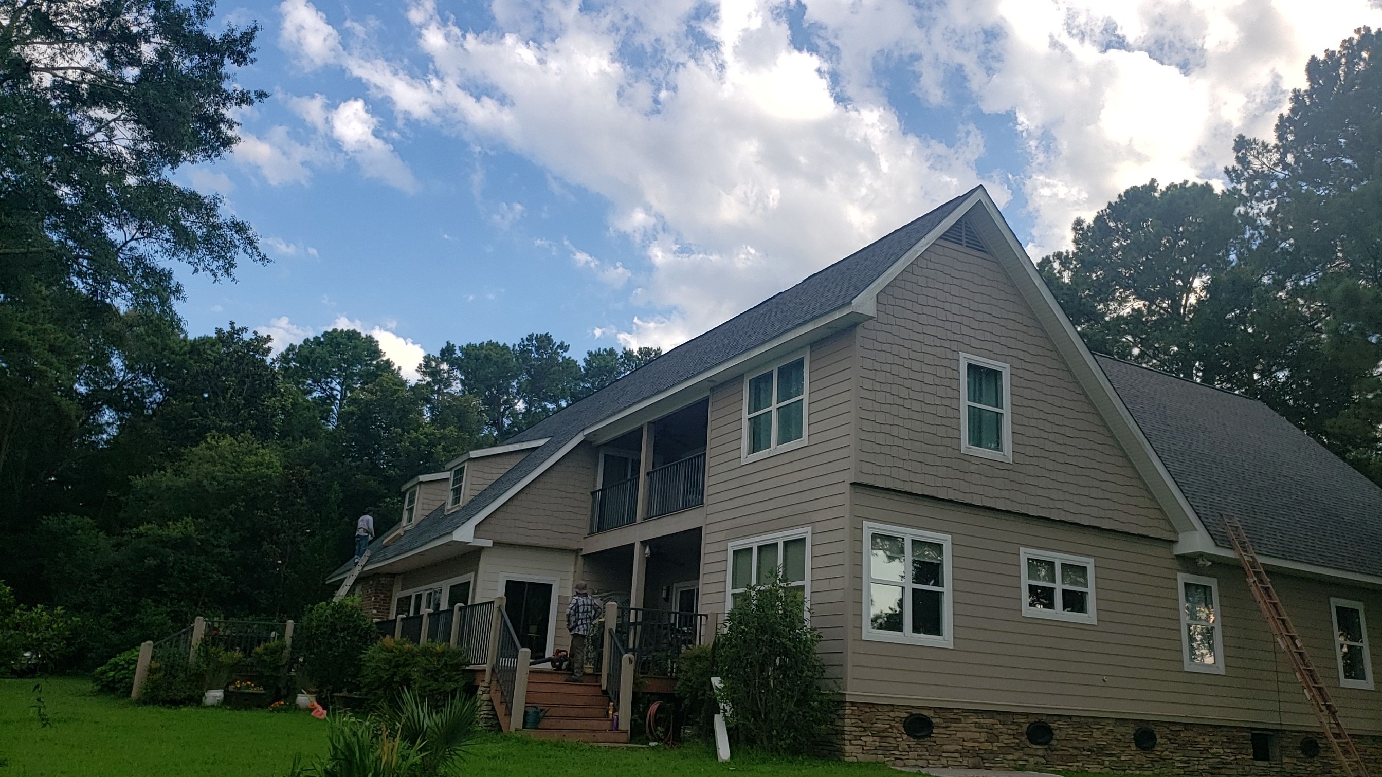 Residential Roofing Installation using Roof Replacement by American Roofing & Construction LLC