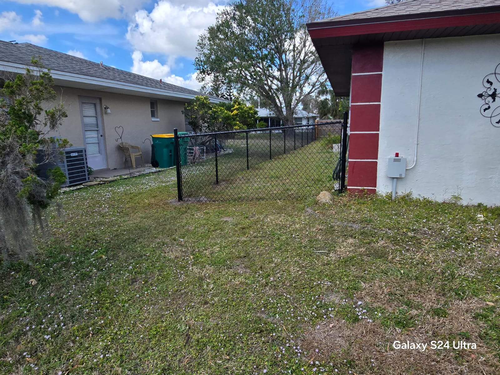 Black Chain Link Fence Installation for Port Charlotte Residence by True Fence LLC