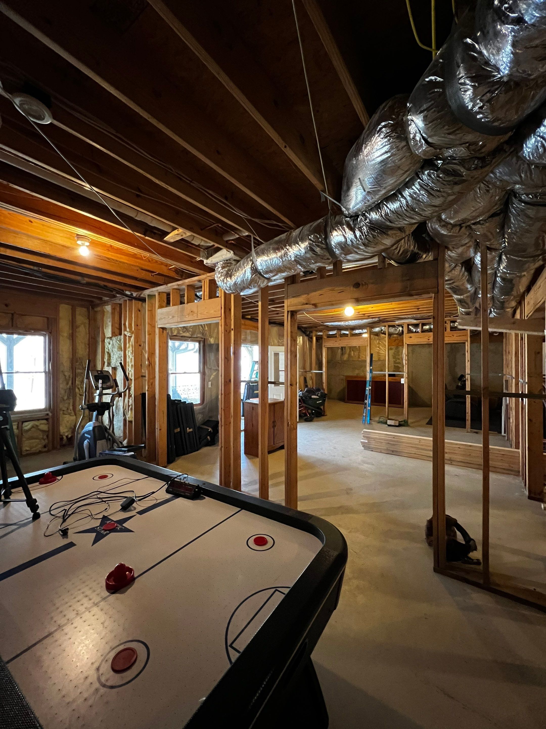 Custom Basement Remodeling With Home Theater and Bar in Woodstock by Swift Home Renovations