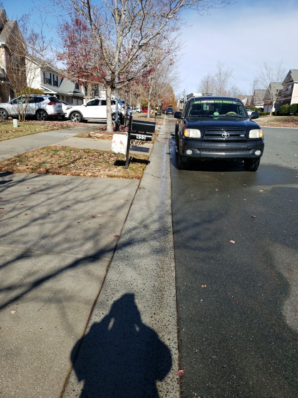 gutters and Driveway by Power Wash Masters LLC