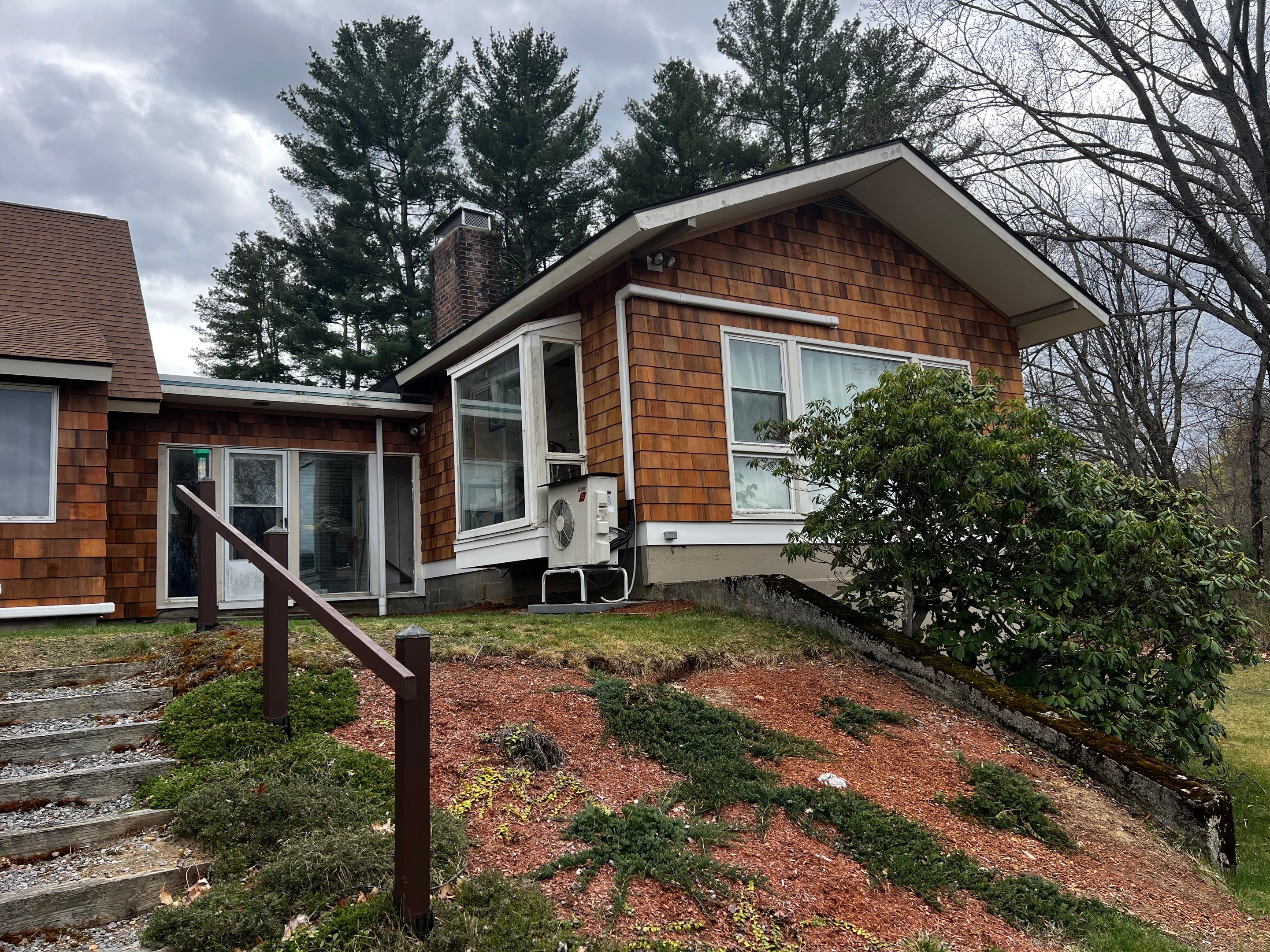 Siding Installation using Perfection Red Western Cedar Shingles  by Loyalty Exterior Solutions 