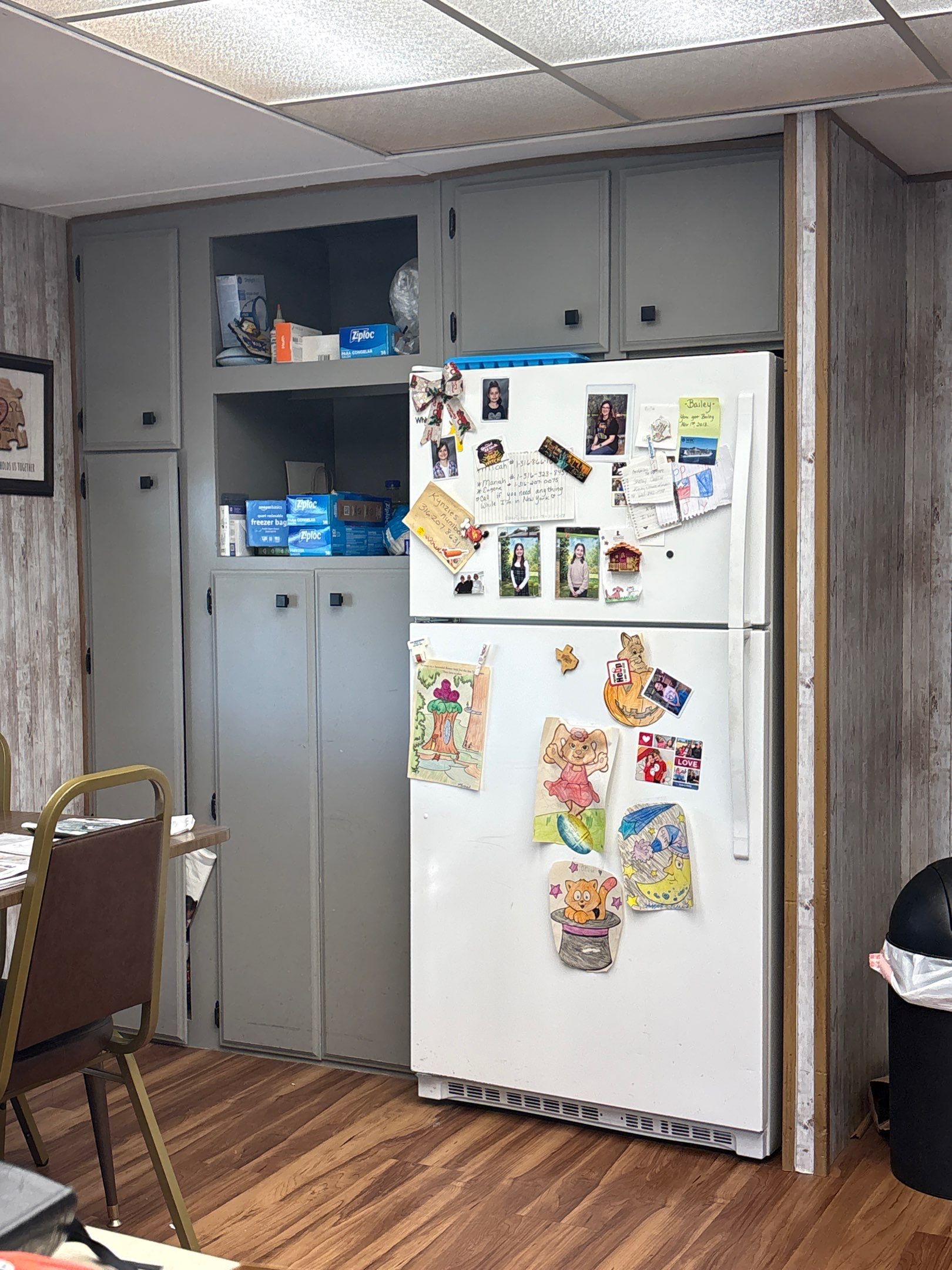 Attica Kitchen Renovation Featuring Grey Cabinetry and Wood-Look Flooring by CompanyCam Sales Demo