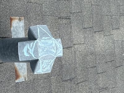Roof vent pipe on asphalt shingle roof