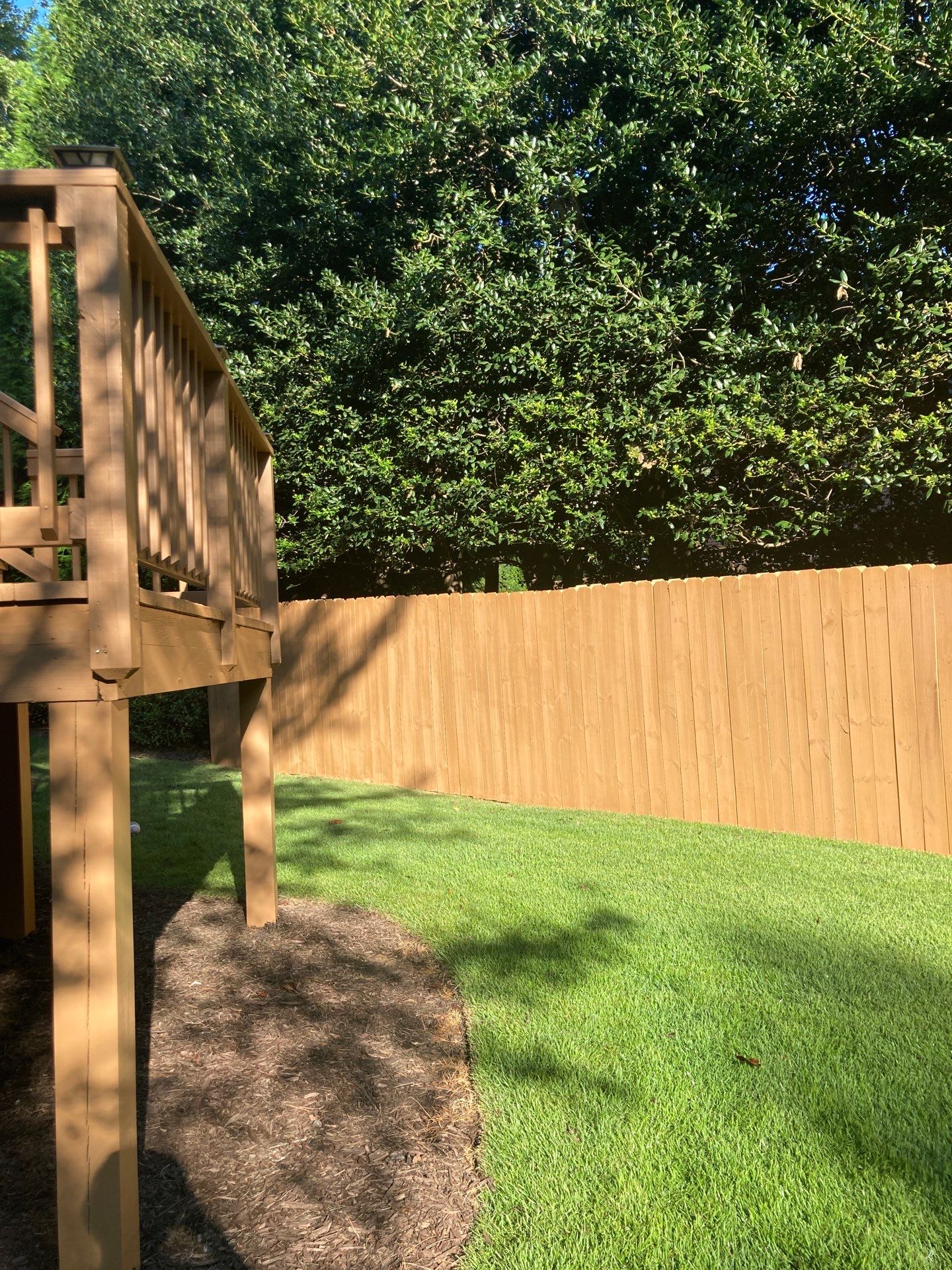 Deck and Fence Stain with Deck Board Repairs in Atlanta, GA by Nelson Exteriors 