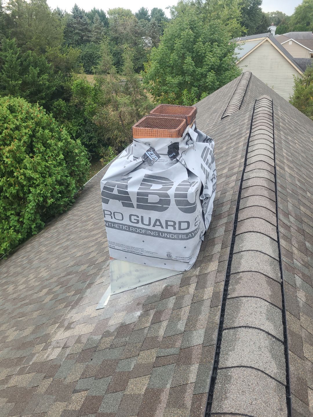Complete Chimney Restoration and Gutter Guard Installation in Littlestown, PA by Bealing Roofing & Exteriors