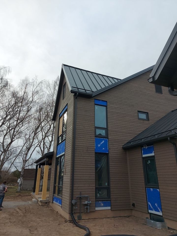 New Home Construction using 16" Standing Seam Panels by Jay Carter Roofing & Sheet Metal