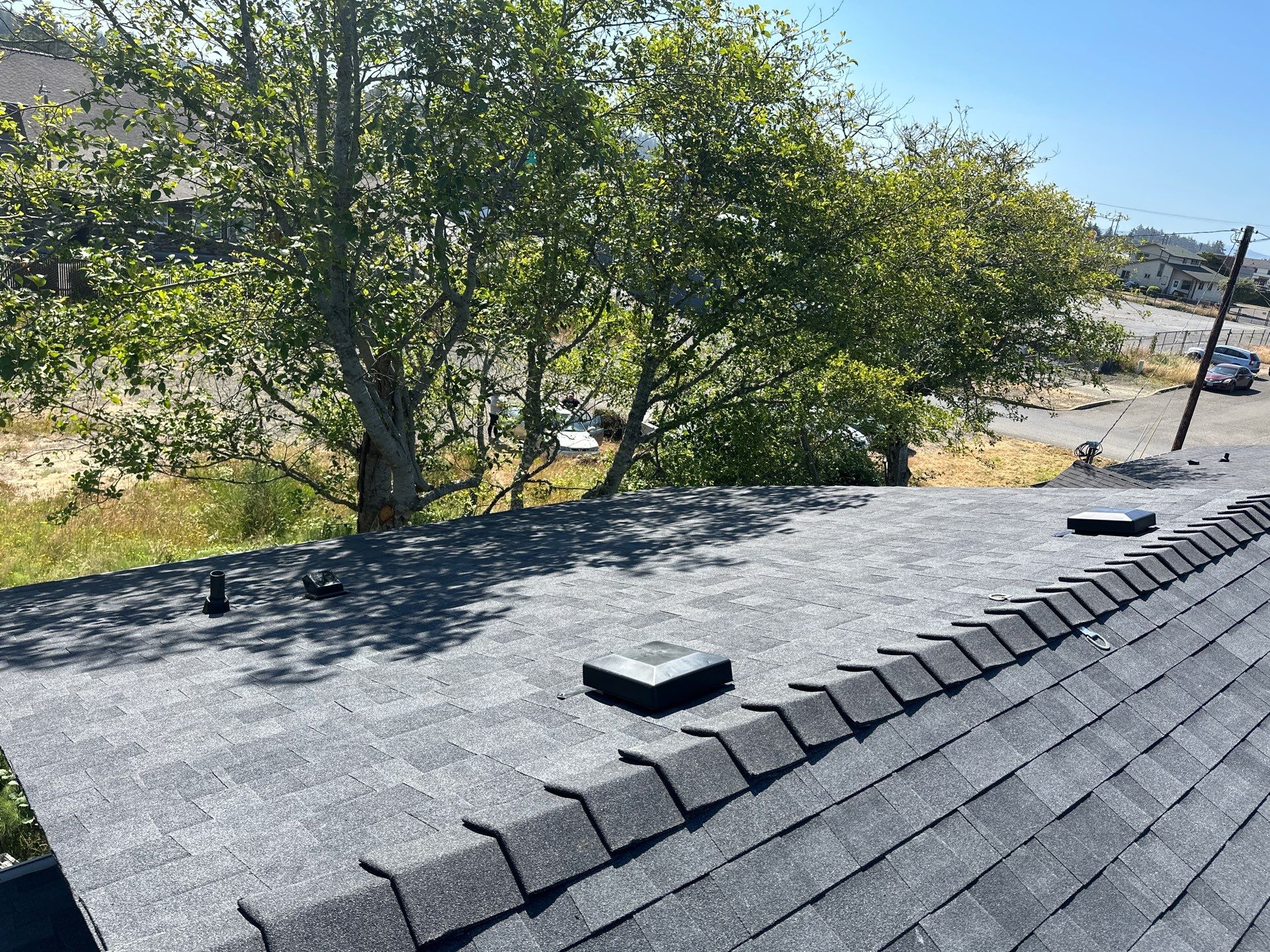 Residential Roofing Installation using Malarkey Highlander (Color: Midnight Black) by Orezona Building & Roofing Company, Inc.