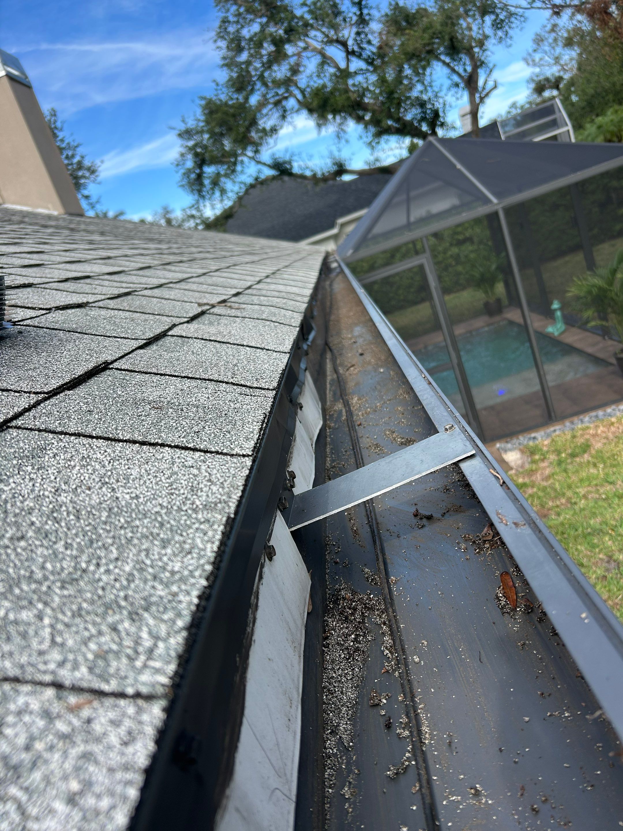 Black Seamless Gutters in Sarasota FL by Gutter Professors