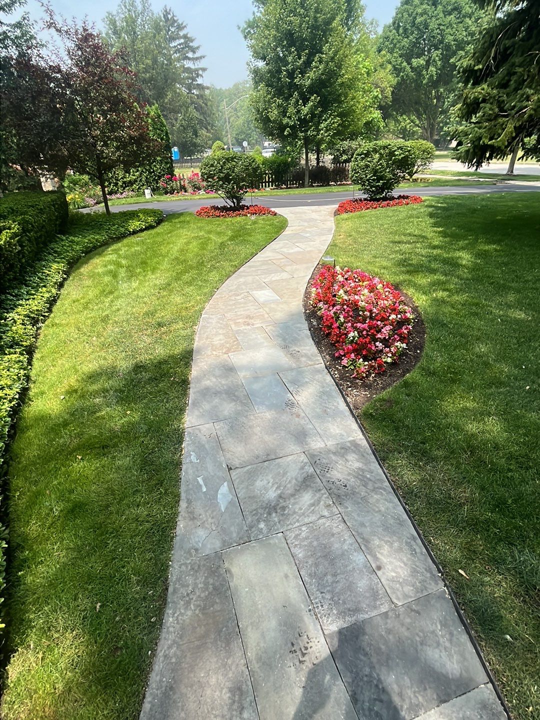 Northbrook, IL stucco home soft wash and stone cleaning by Northern Power Washing LLC.