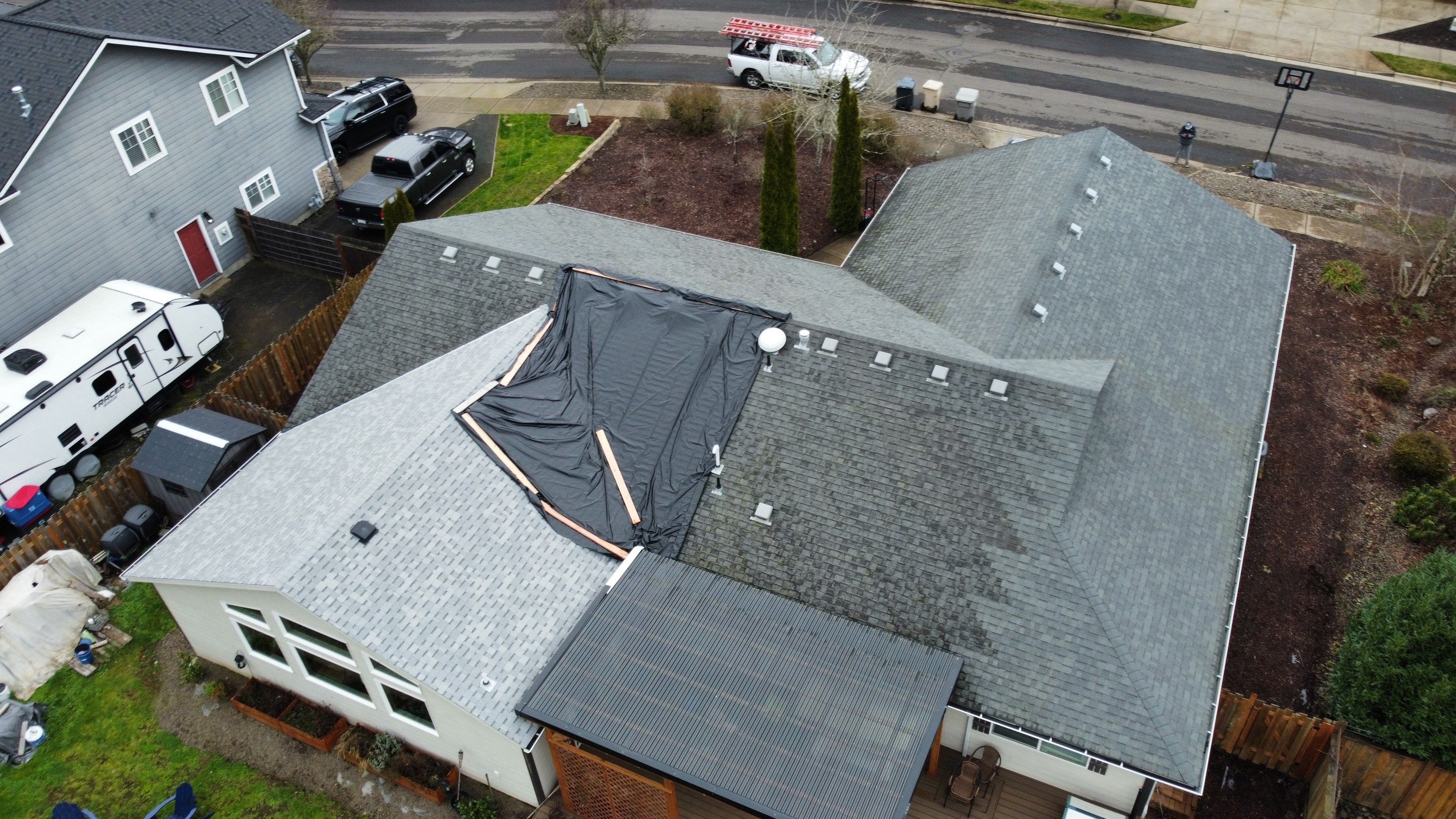 Residential Roofing Installation using IKO Cambridge (Color: Dual Grey) by Orezona Building & Roofing Company, Inc.