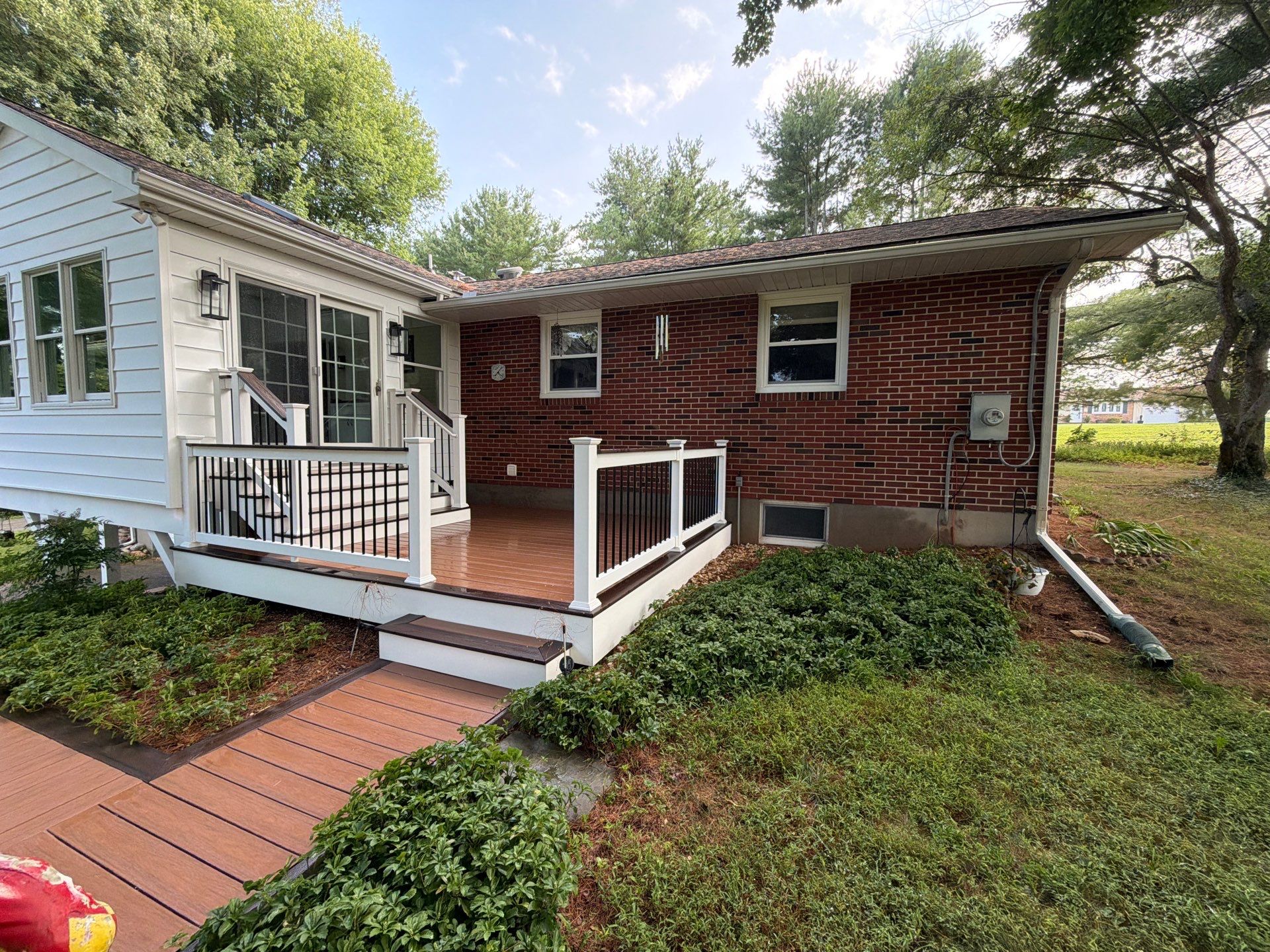 Composite Deck Construction and Exterior Walkway in Sykesville by Baltimore Pressure Washers Inc.