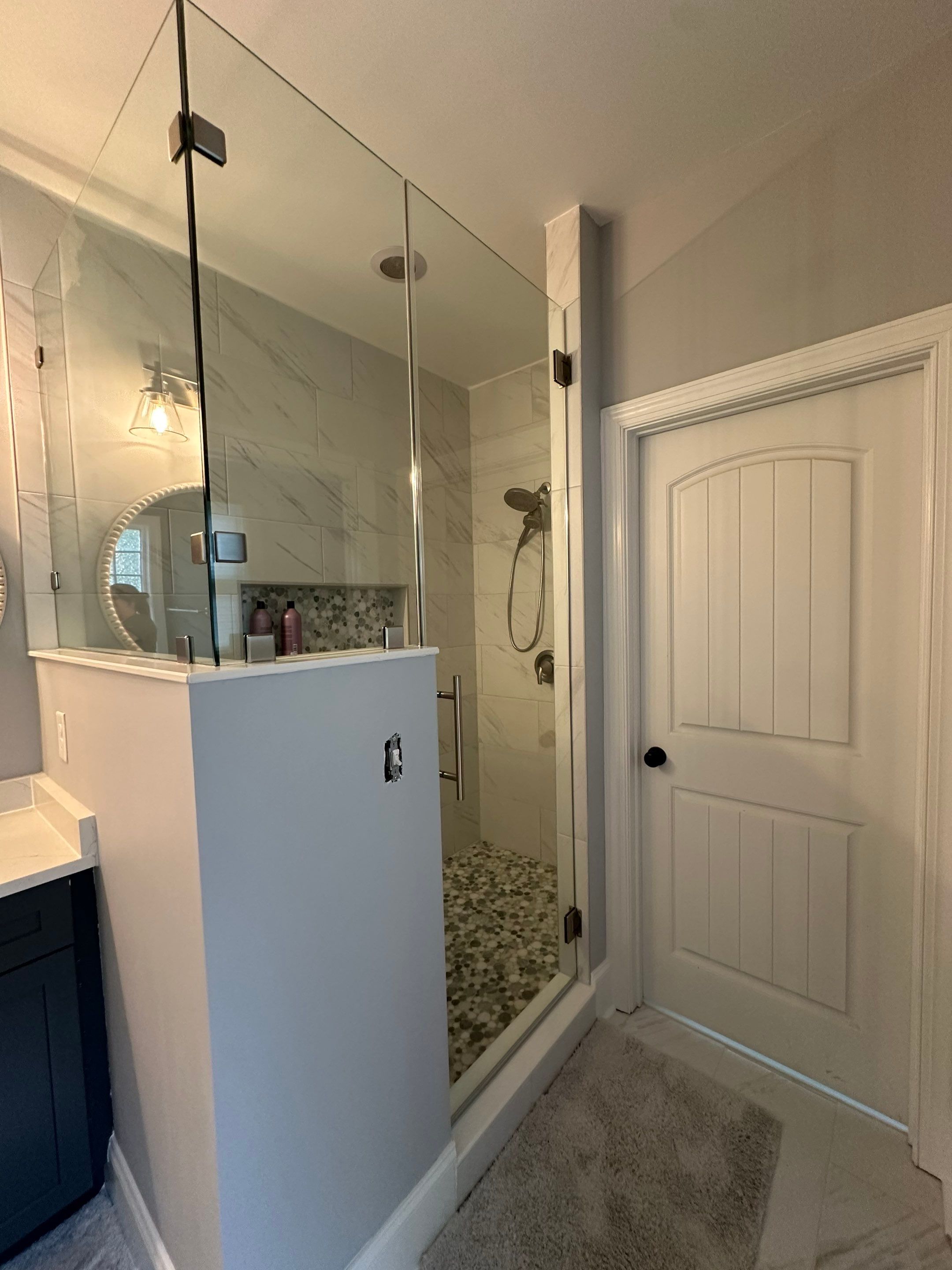 Bright Bathroom Remodel with Wall Removal, Stand Alone Tub and New Vanity by Footprints Floors of Coastal Carolina
