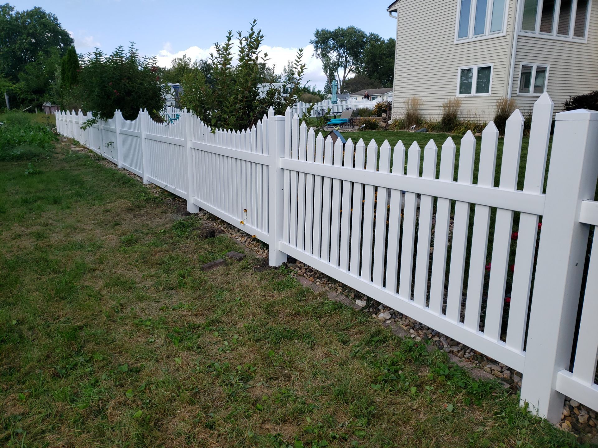 White Vinyl Spaced Picket Fence Installation in Waterloo by Perfect Picket Fence and Stain
