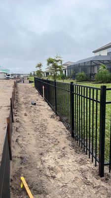 Aluminum Fence Installation using Black 3 Rail Aluminum Fence