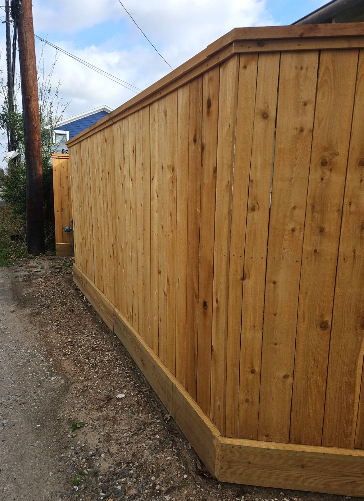 Durable Fence & Gate Installation with Premium Stain by Tim's Fences