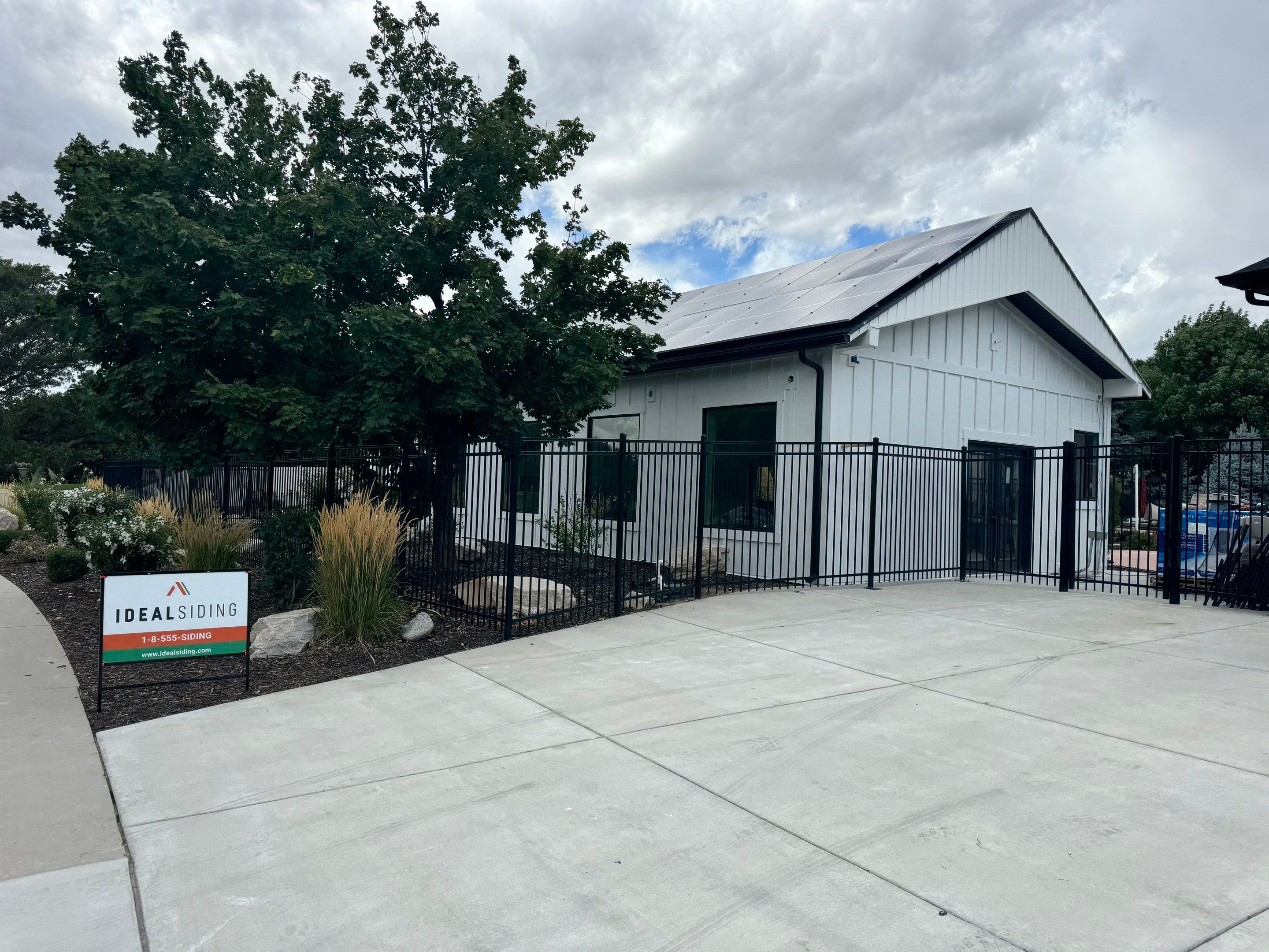 Highland | Modern Farmhouse Board & Batten | Arctic White & Black by Ideal Siding Utah