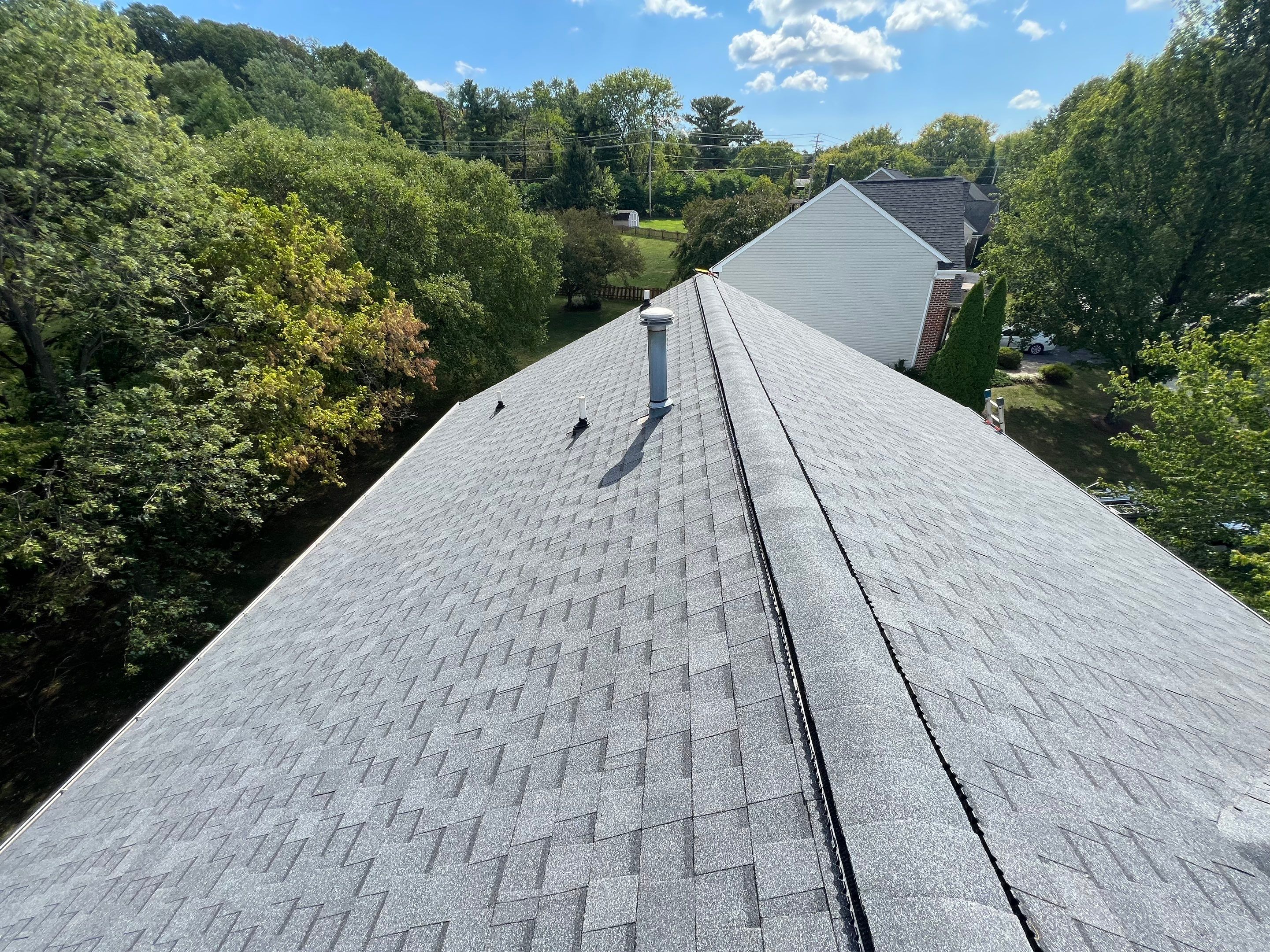Residential Roofing Installation using Atlas Pinnacle Pristine Pewter Architectural Shingles by Frederick Roof Repair